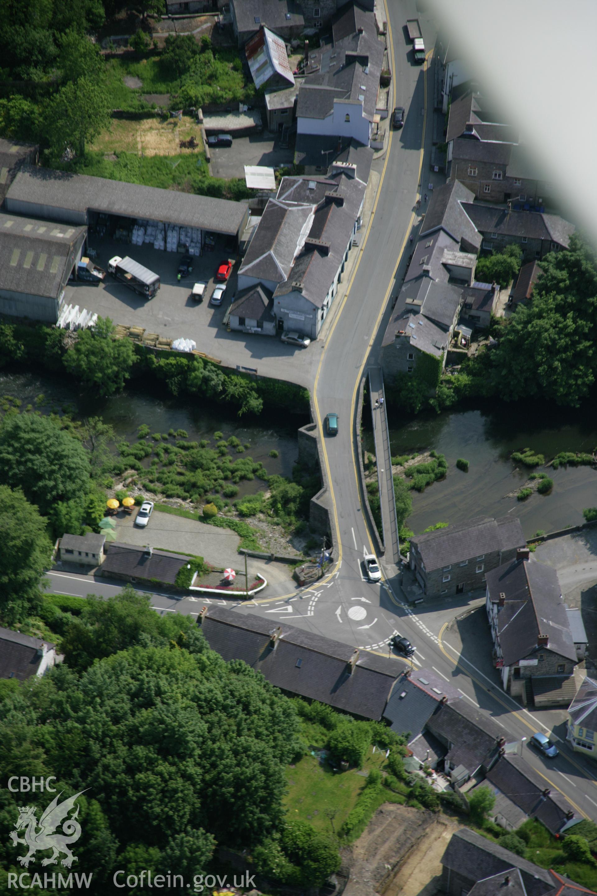 RCAHMW colour oblique aerial photograph of Newcastle Emlyn Bridge, viewed from the north. Taken on 08 June 2006 by Toby Driver.