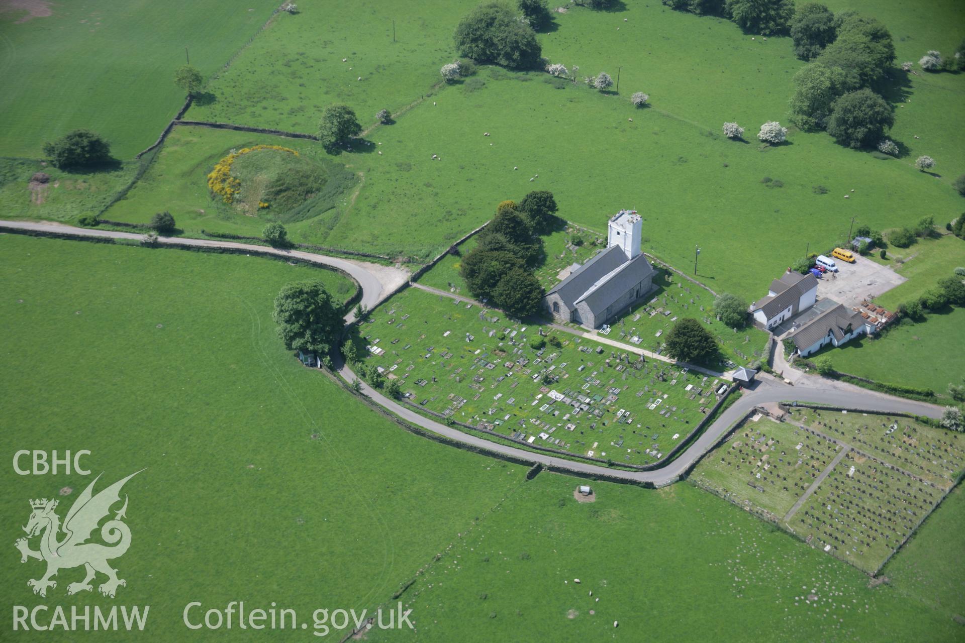 RCAHMW colour oblique aerial photograph of Twyn Tudur Motte from the north-east. Taken on 09 June 2006 by Toby Driver.