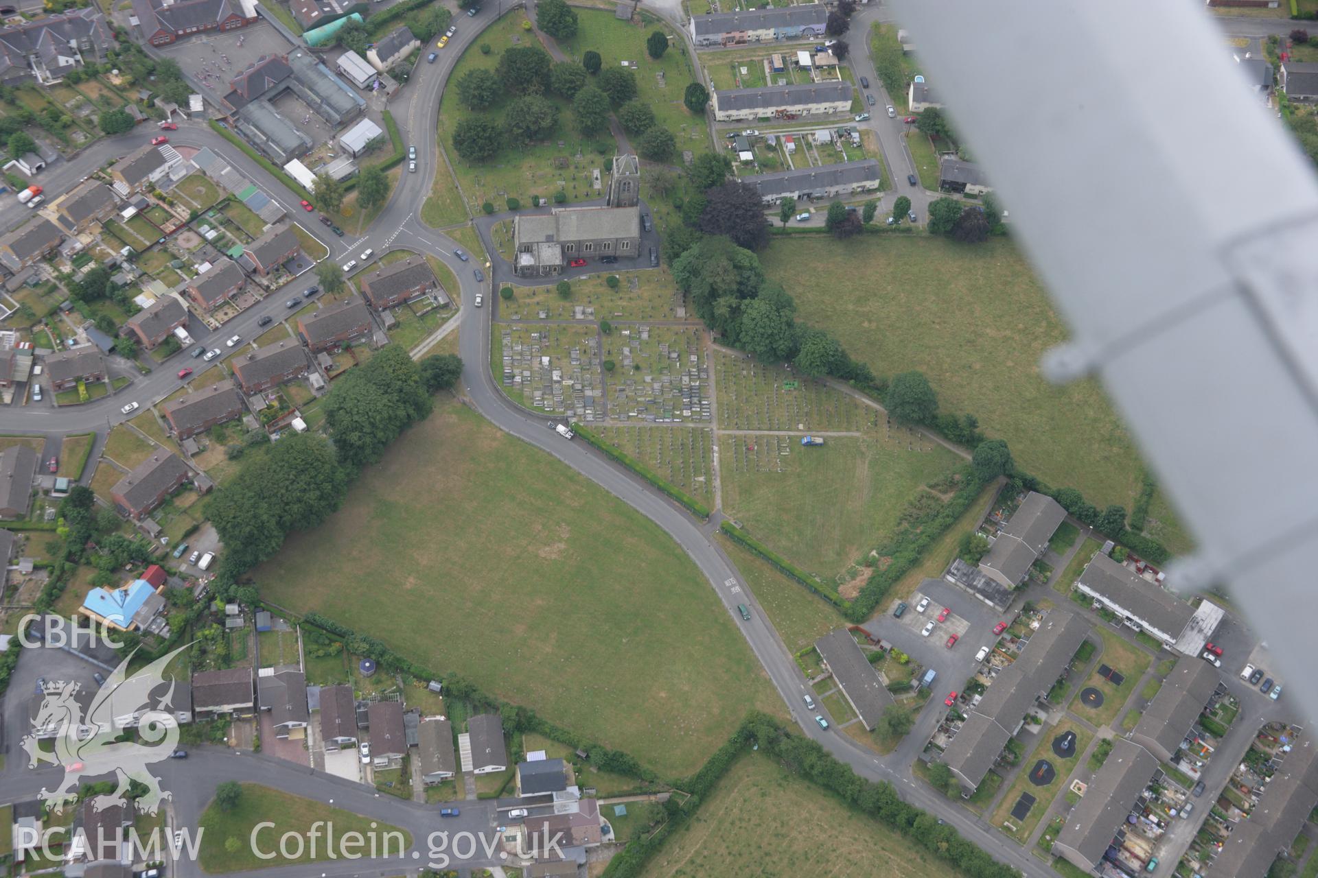 RCAHMW colour oblique aerial photograph of St Peter's Church, Lampeter. Taken on 21 July 2006 by Toby Driver.