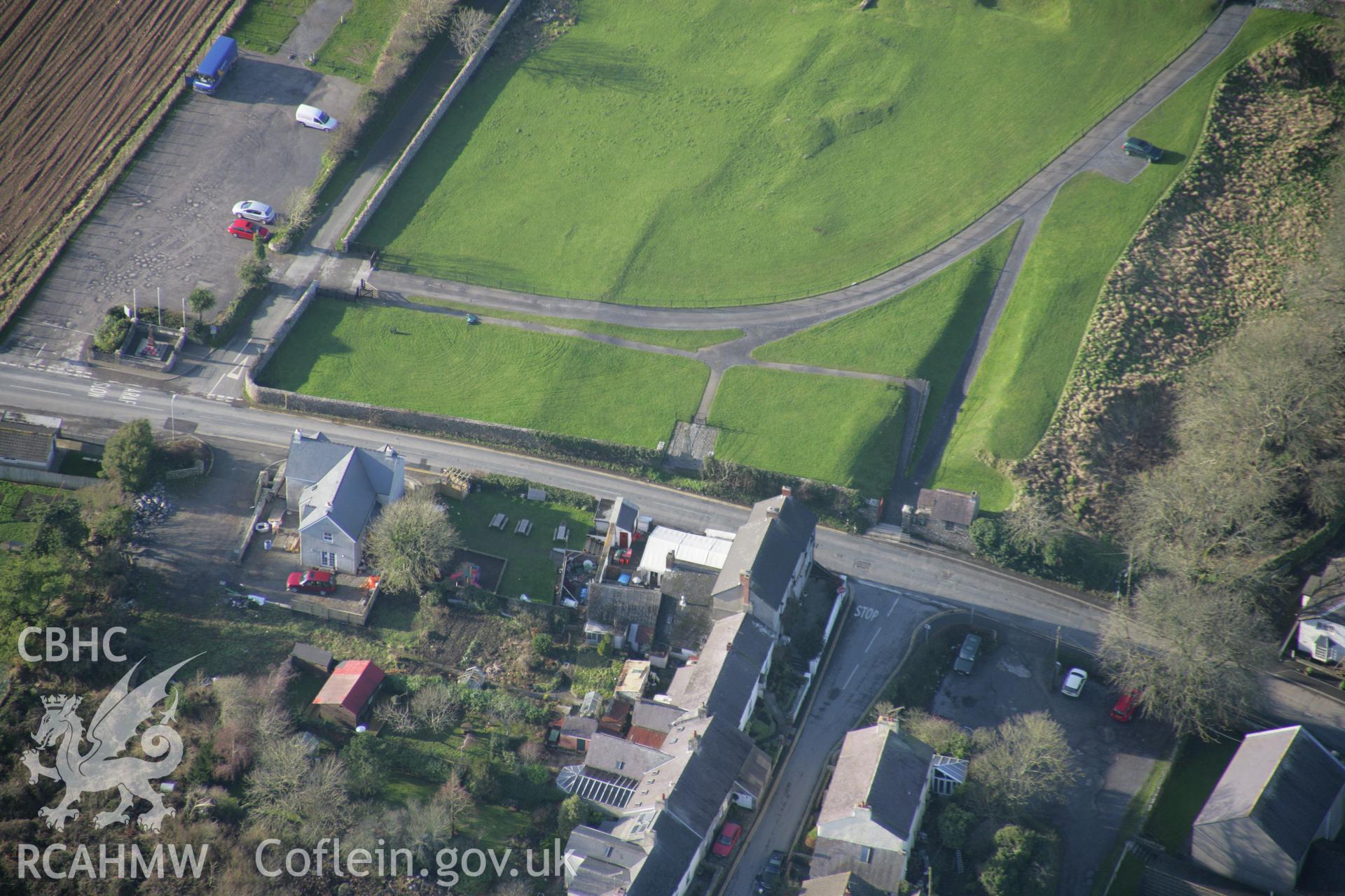 RCAHMW colour oblique aerial photograph of Carew High Cross from the east. Taken on 11 January 2006 by Toby Driver.