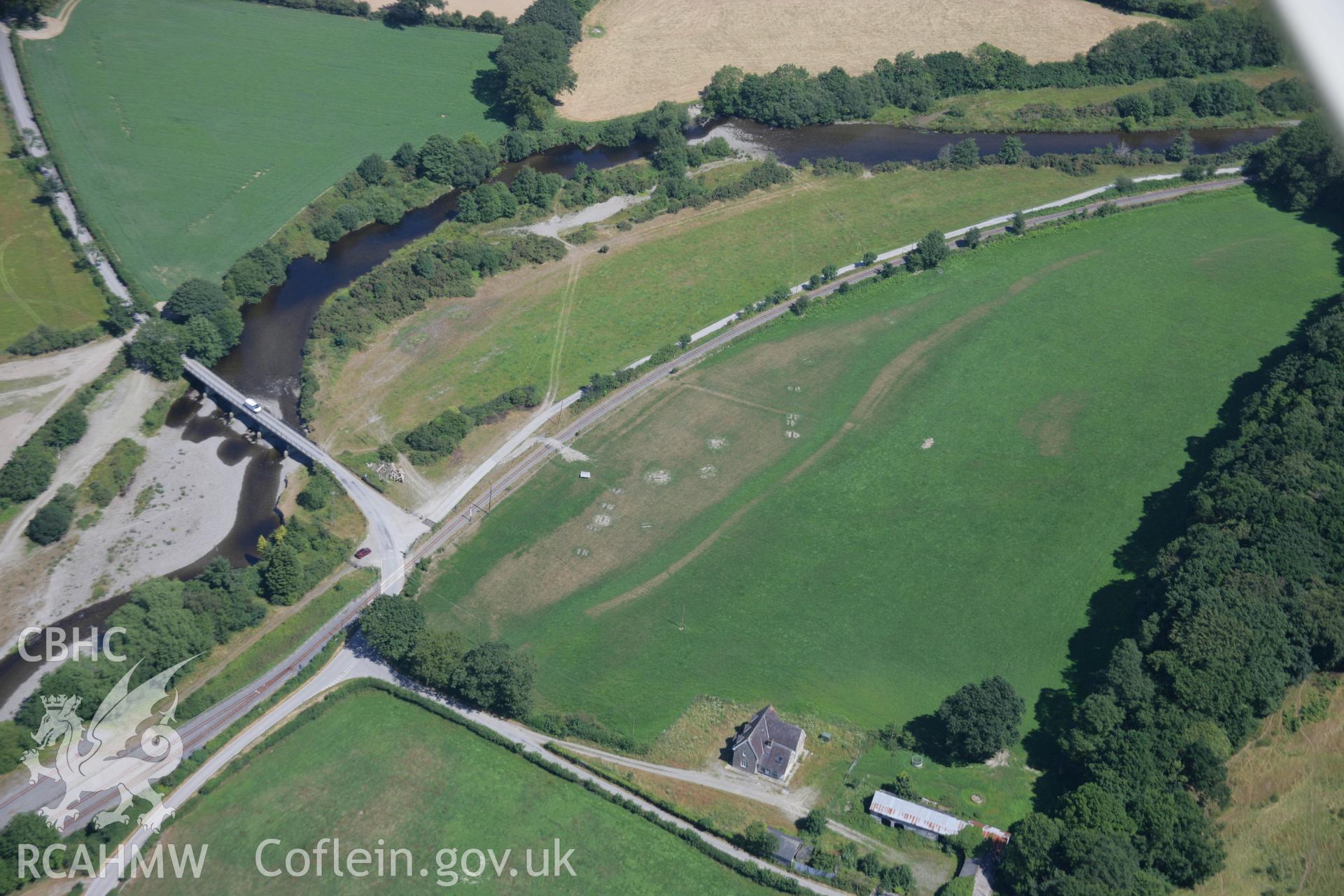 RCAHMW colour oblique aerial photograph showing square parchmarks, Rhiwarthen near Capel Bangor Railway Station. Taken on 17 July 2006 by Toby Driver.