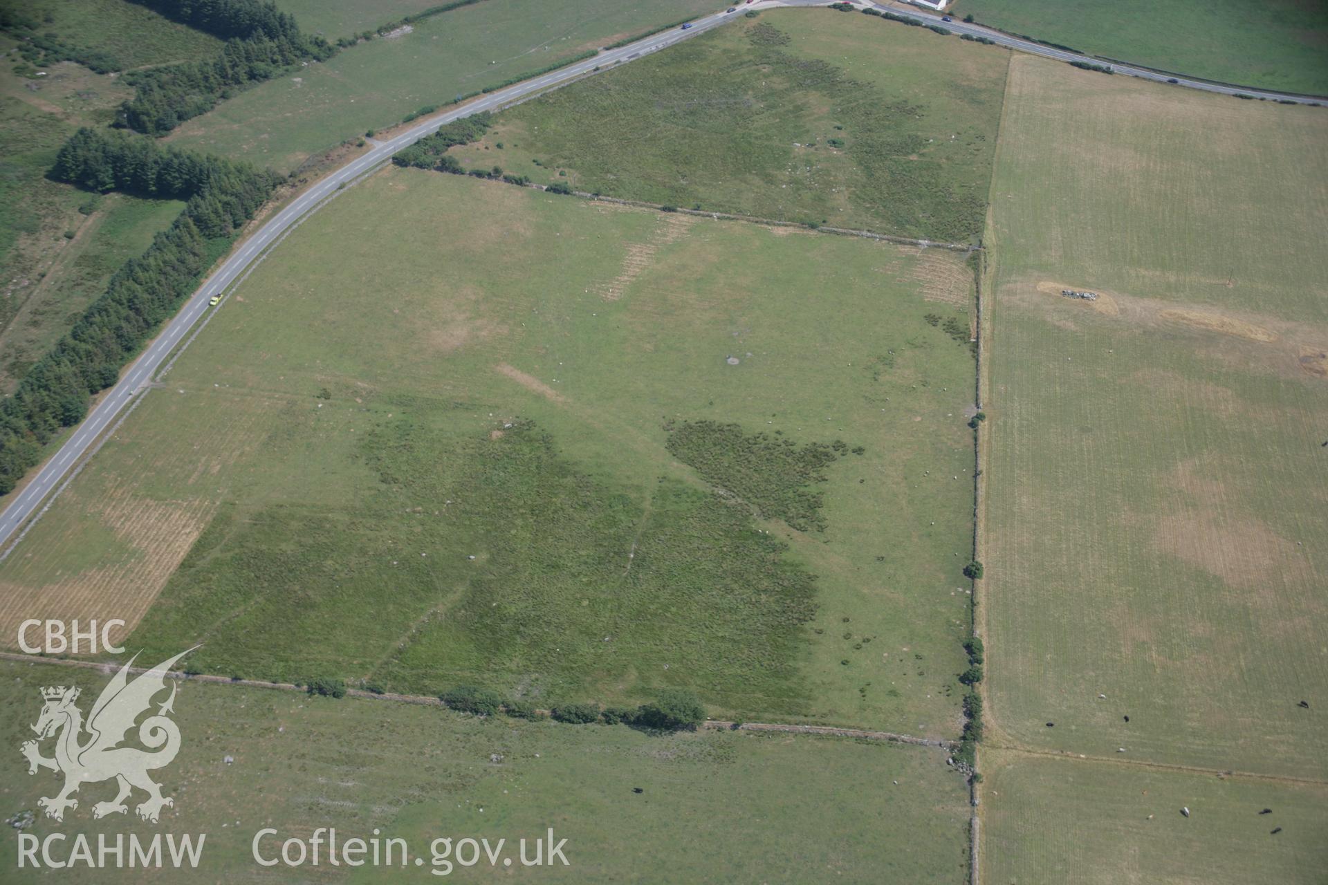 RCAHMW colour oblique aerial photograph of Roman road parchmarks Taken on 25 July 2006 by Toby Driver.