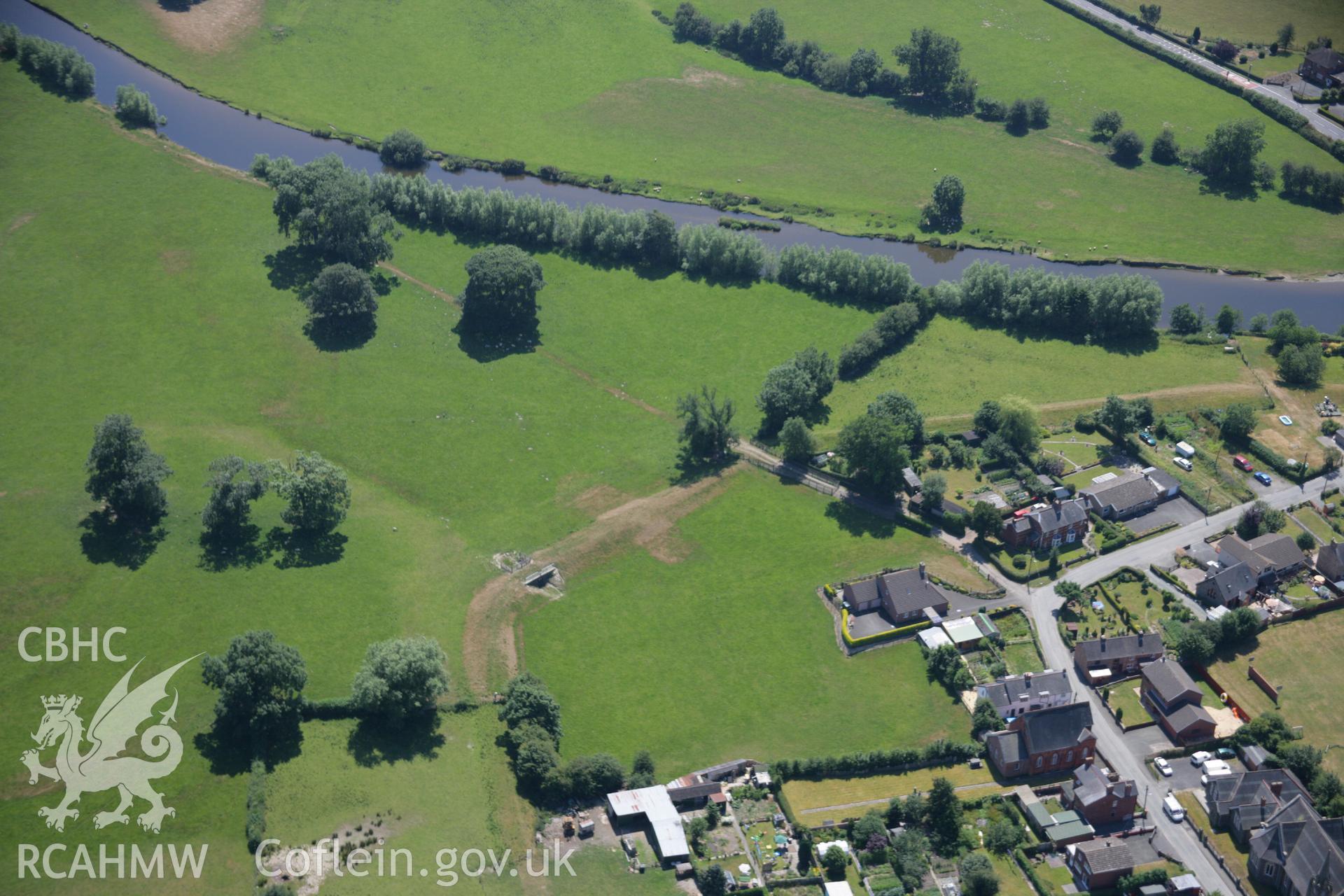 RCAHMW colour oblique aerial photograph of Caersws Roman Military Settlement. Taken on 17 July 2006 by Toby Driver.