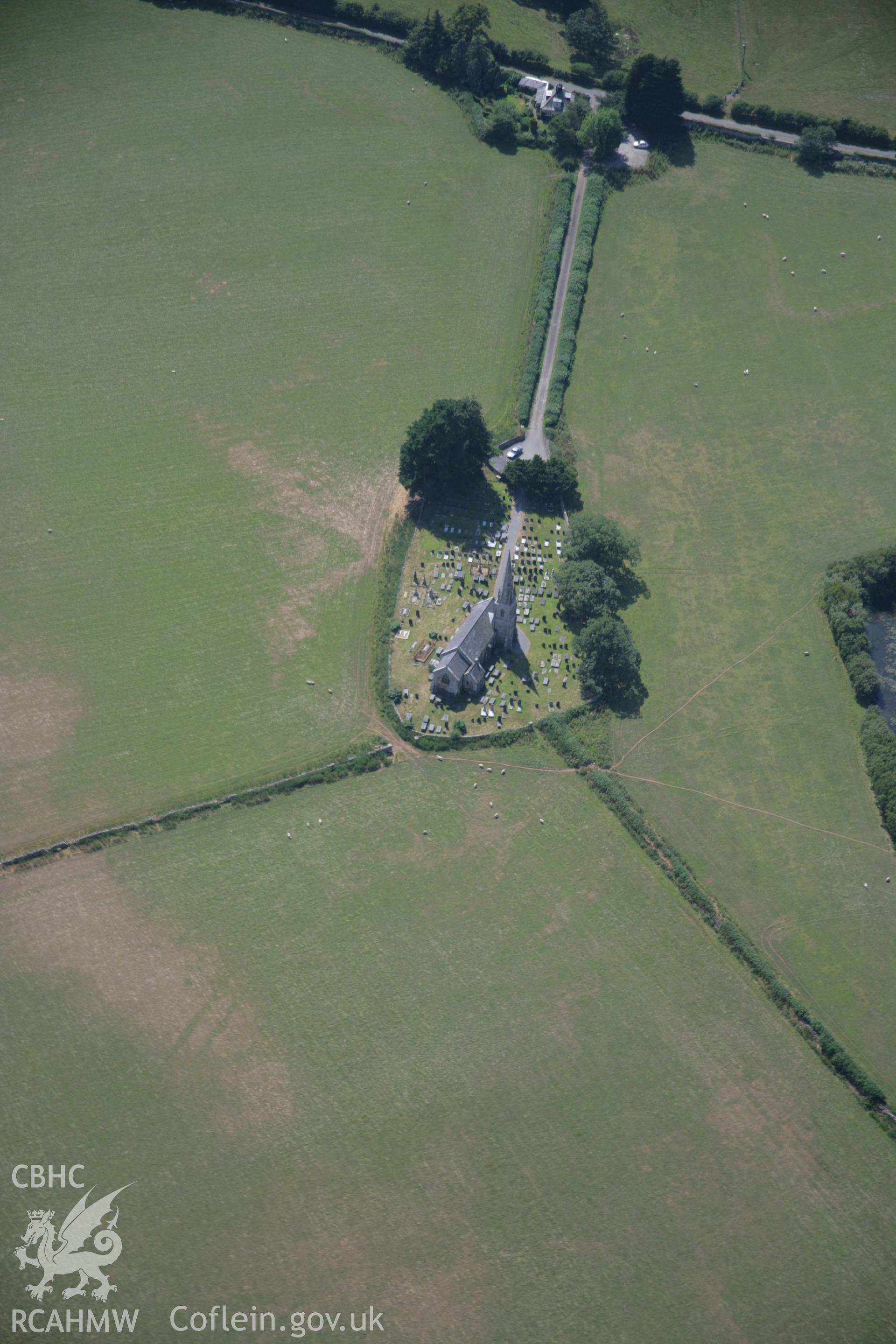 RCAHMW colour oblique aerial photograph of St Edwen's Church, Llanedwen. Taken on 25 July 2006 by Toby Driver.