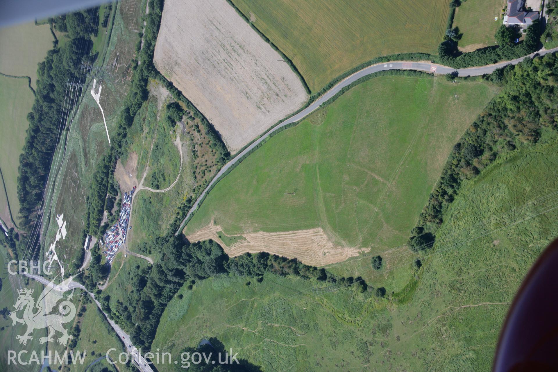 RCAHMW colour oblique aerial photograph of settlement earthworks at Llancadle Shrunken Village. Taken on 24 July 2006 by Toby Driver.