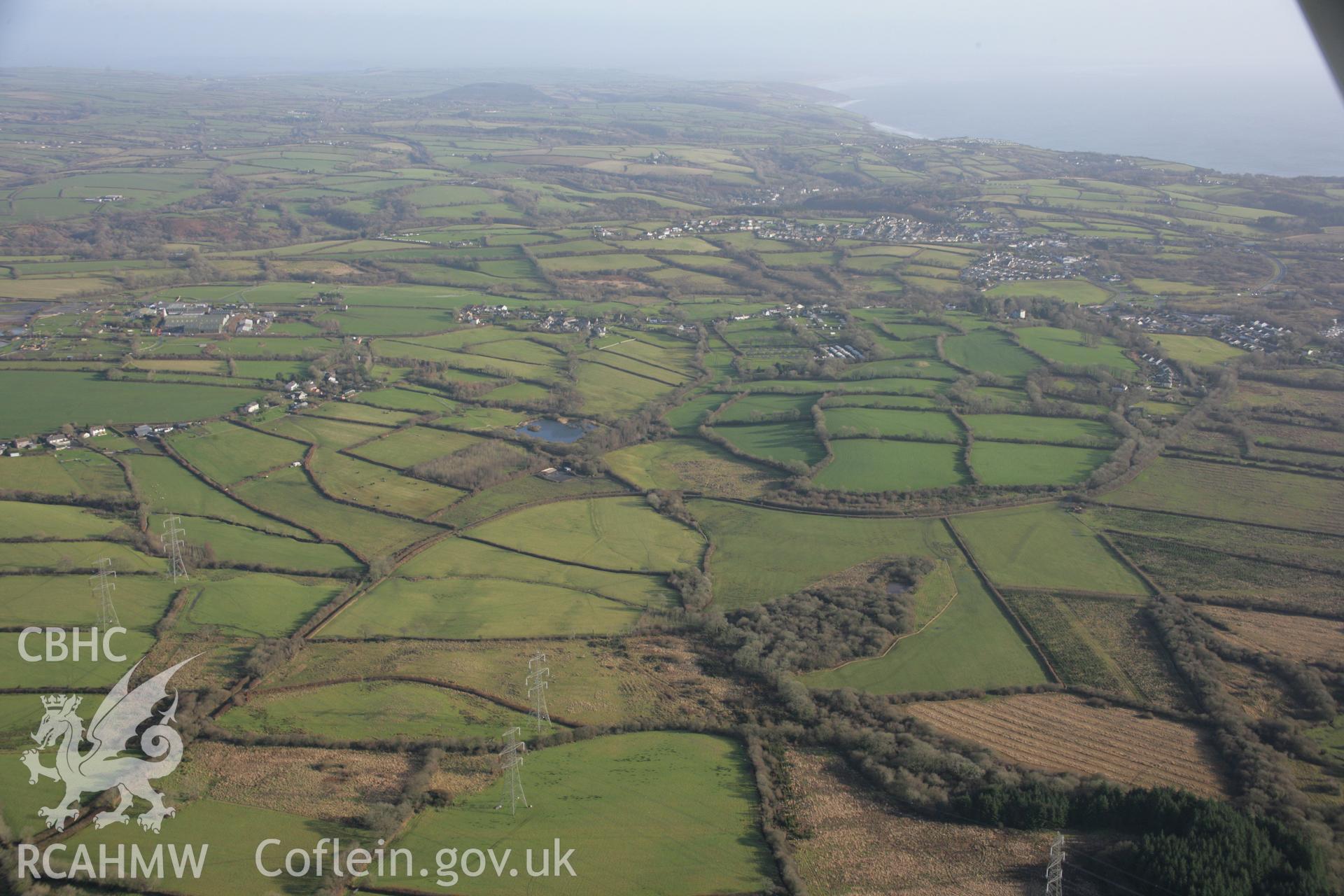 RCAHMW colour oblique aerial photograph of the Thomas Chapel to Begelly section of the Saundersfoot Railway. A view looking south-east over Begelly. Taken on 11 January 2006 by Toby Driver.