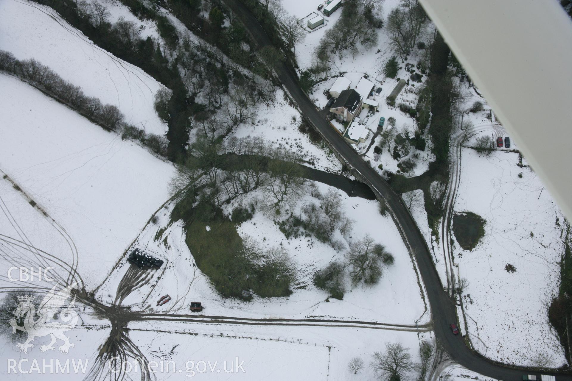 RCAHMW colour oblique aerial photograph of Tomen-y-Faerdre from the north-east. Taken on 06 March 2006 by Toby Driver.