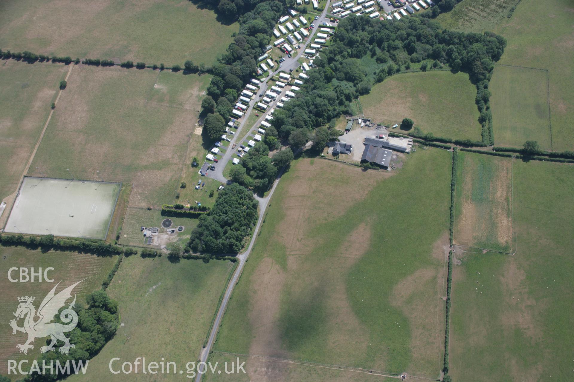 RCAHMW colour oblique aerial photograph of Yr Hendre Field System, Efailnewydd, viewed from the north-west. Taken on 03 August 2006 by Toby Driver