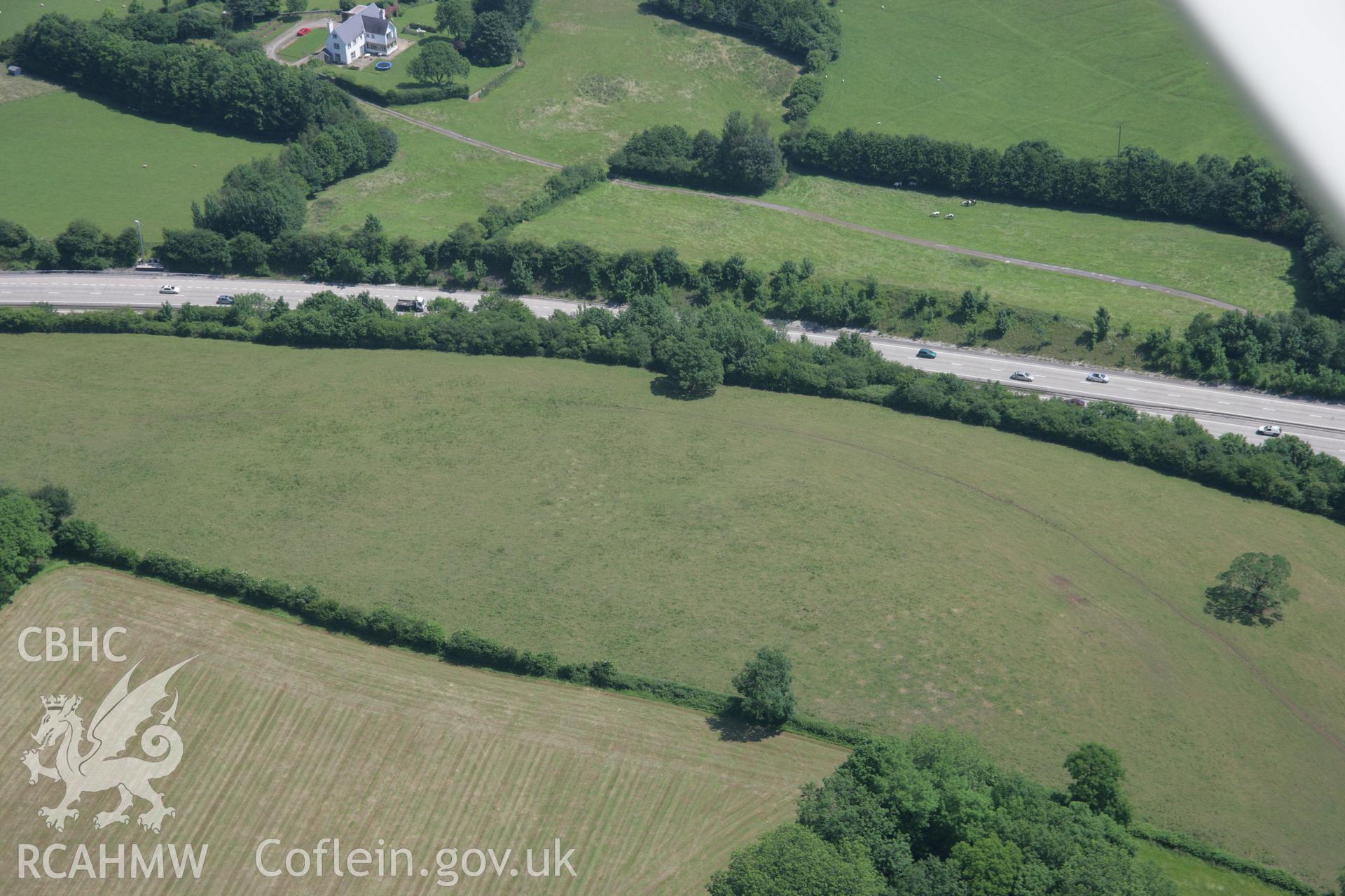 RCAHMW colour oblique photograph of Sant-y-Nyll barrow. Taken by Toby Driver on 29/06/2006.