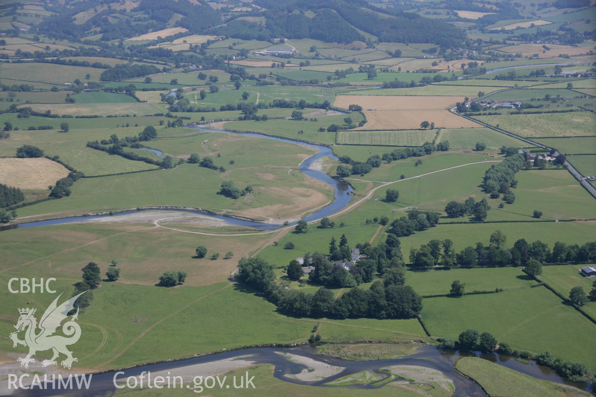 RCAHMW colour oblique aerial photograph of Roman road parchmarks, Maesmawr Hall. Taken on 17 July 2006 by Toby Driver.