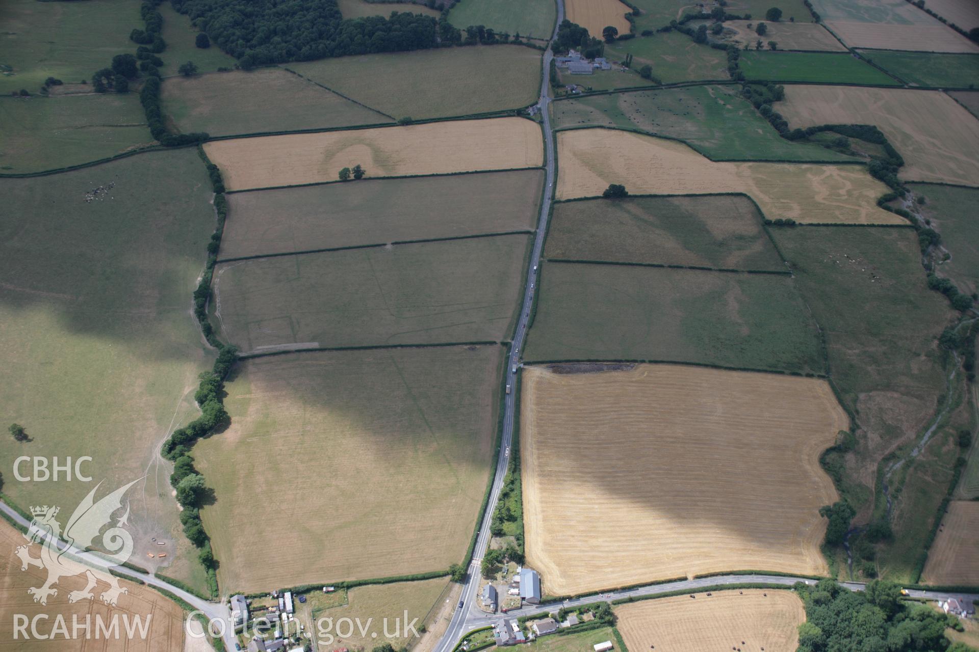 RCAHMW colour oblique aerial photograph of Walton Roman Camps II and III. Taken on 27 July 2006 by Toby Driver