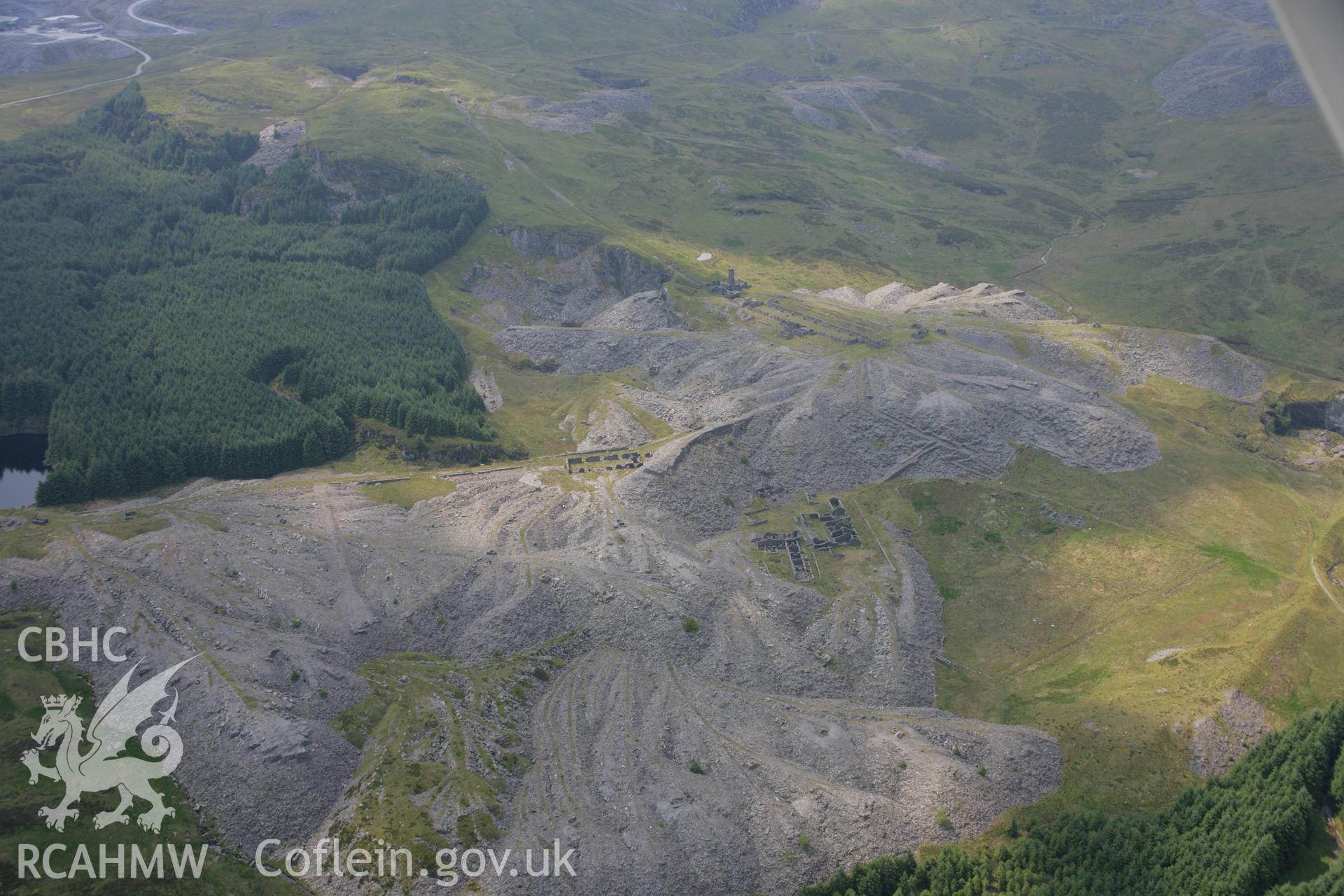 RCAHMW colour oblique aerial photograph of Rhiw-Bach Slate Quarry. Taken on 04 July 2006 by Toby Driver.
