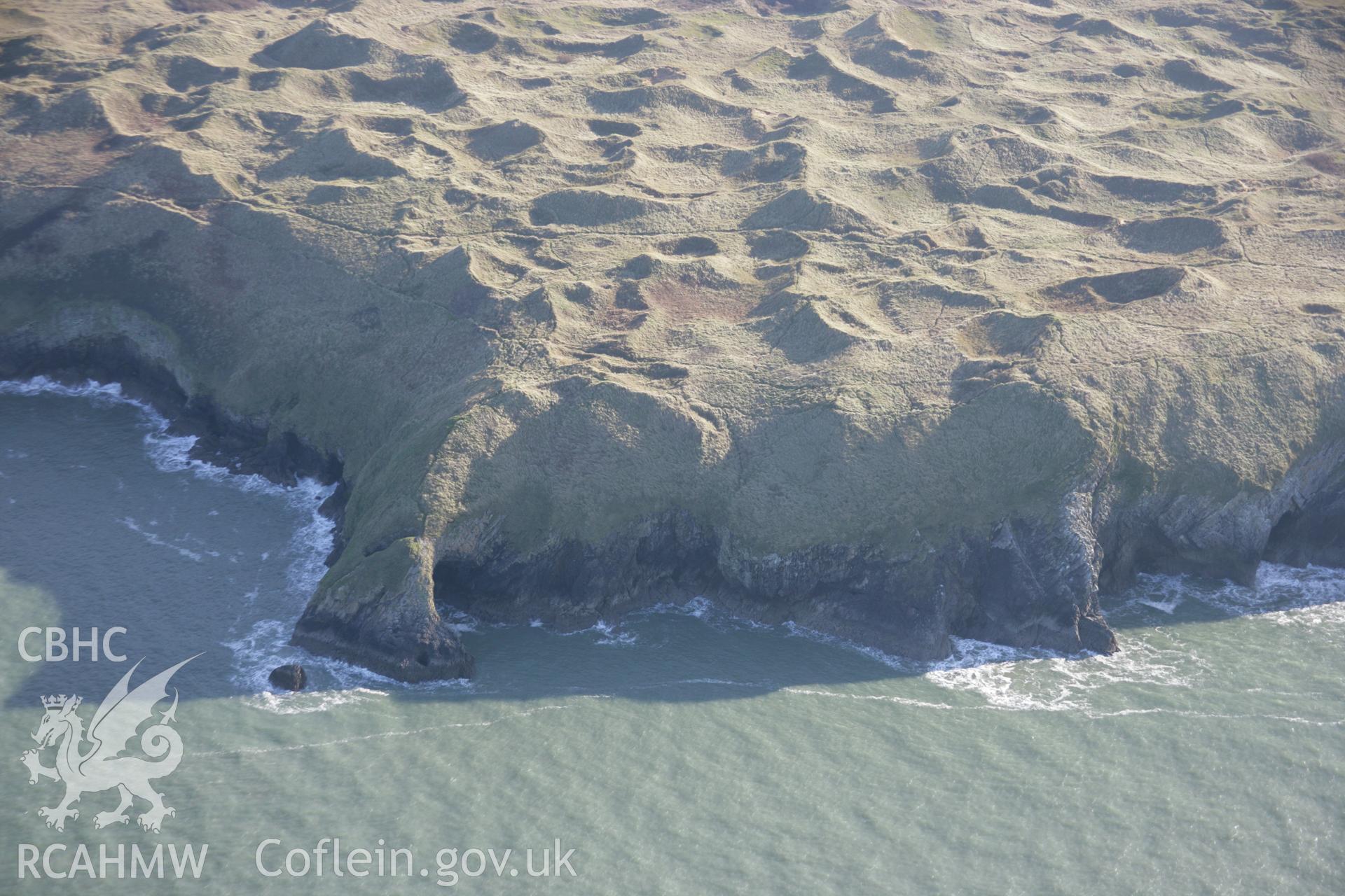 RCAHMW colour oblique aerial photograph of Culver Hole and the cliffs from the north-west. Taken on 26 January 2006 by Toby Driver.