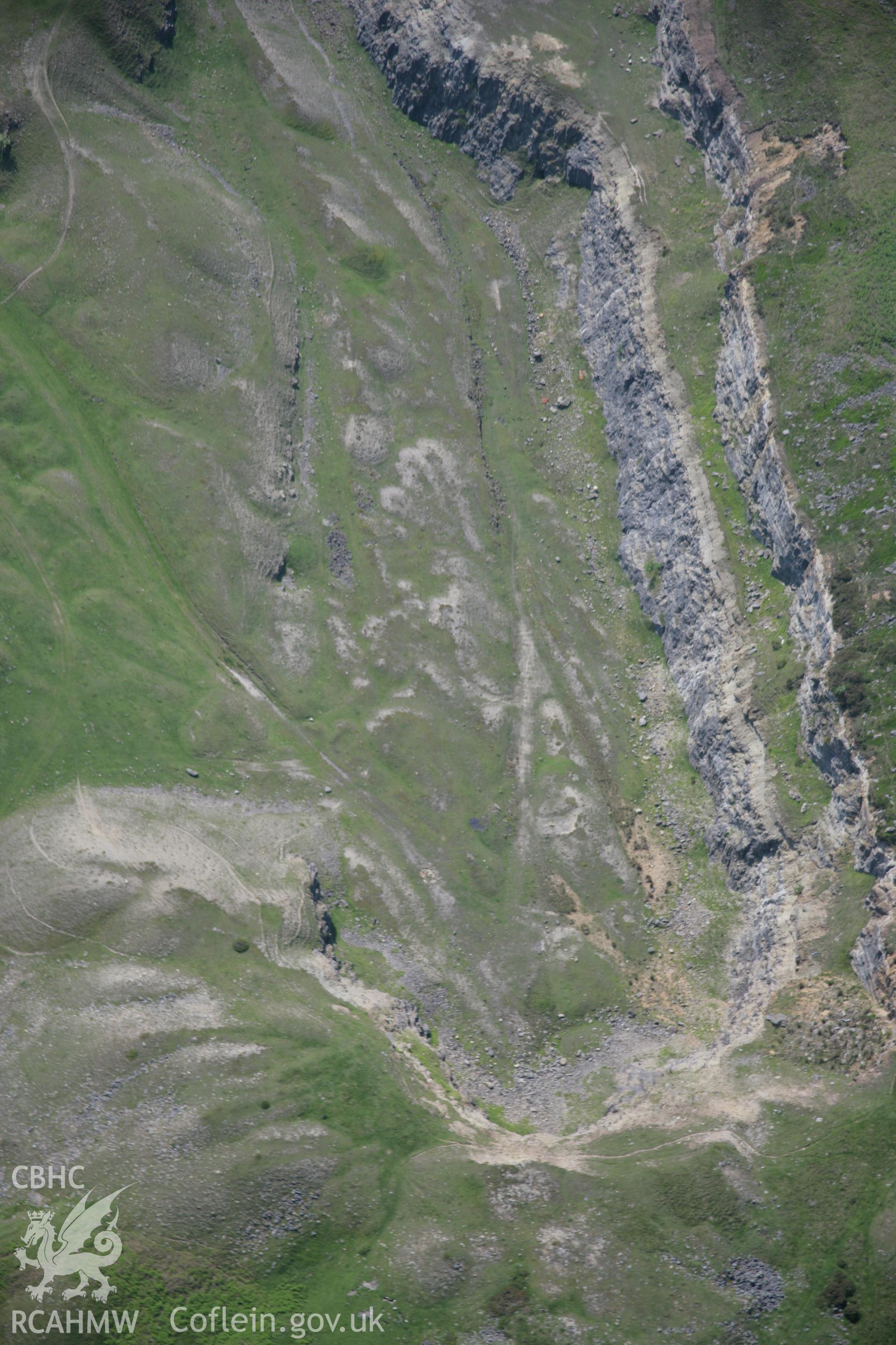 RCAHMW colour oblique aerial photograph of Tyla West Quarry, Gilwern Hill, Clydach, from the north-west. Taken on 09 June 2006 by Toby Driver.