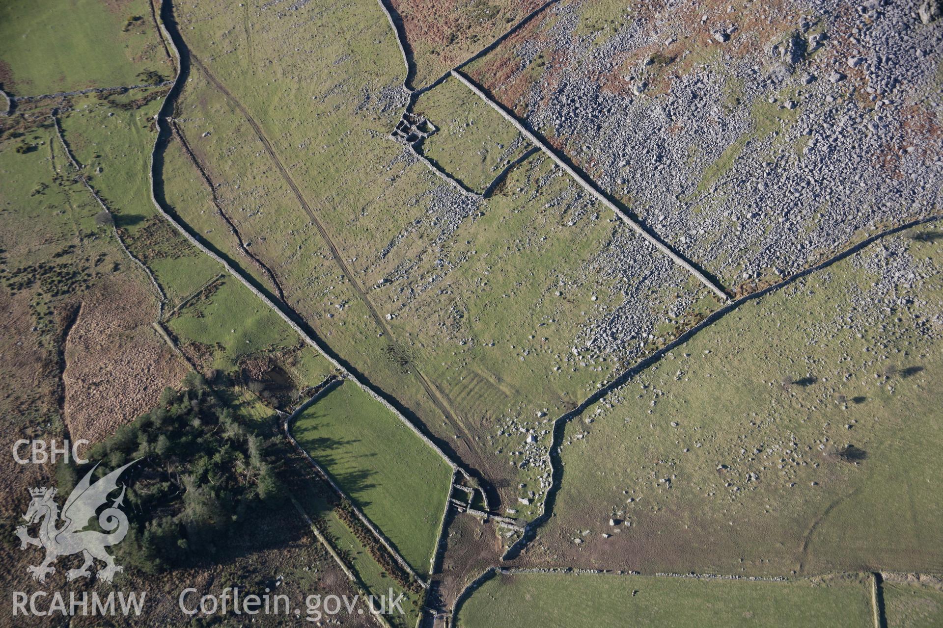 RCAHMW colour oblique aerial photograph of Tyddyn Mawr Culivation Beds from the south-east. Taken on 09 February 2006 by Toby Driver.