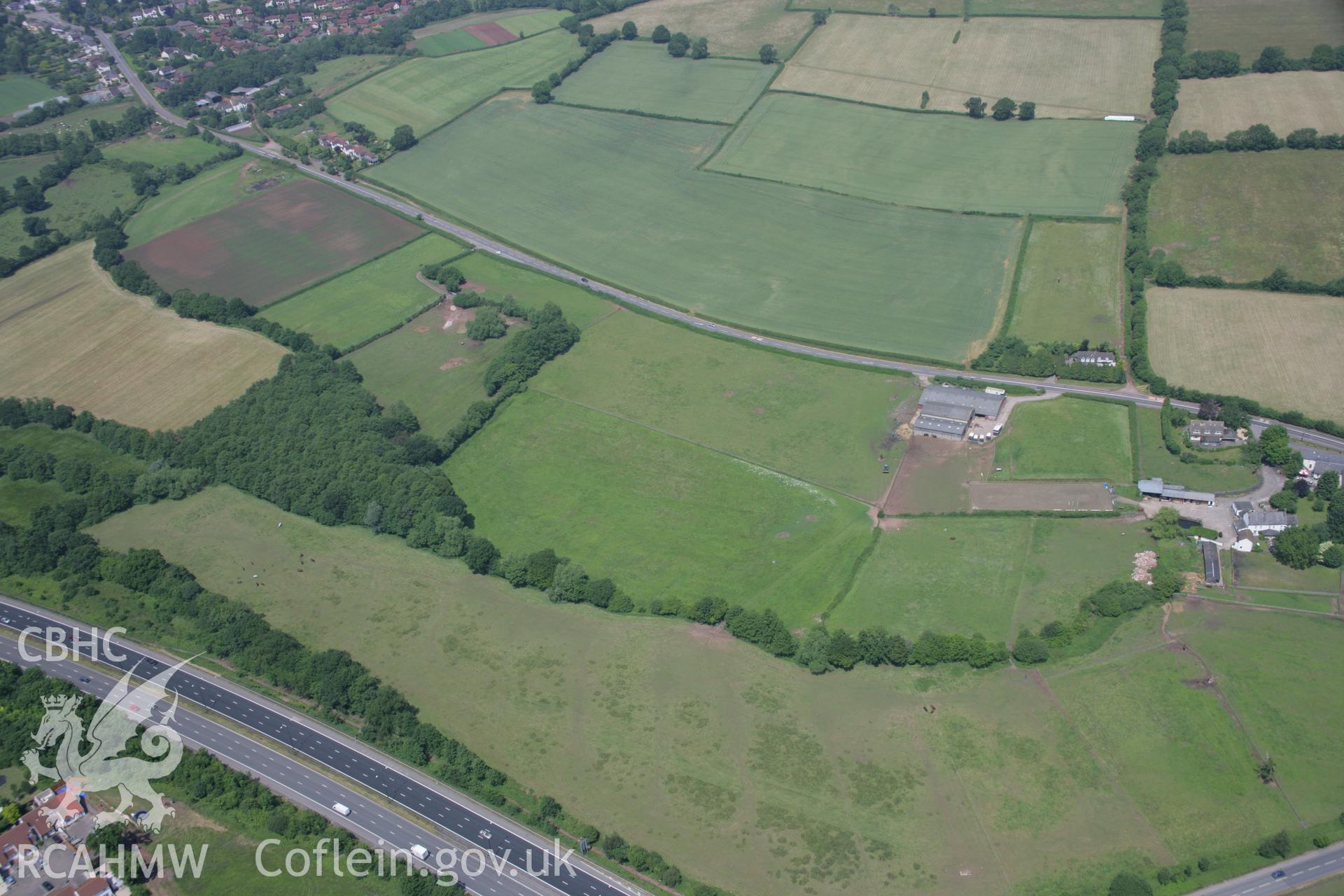 RCAHMW colour oblique photograph of Court Farm moat. Taken by Toby Driver on 29/06/2006.