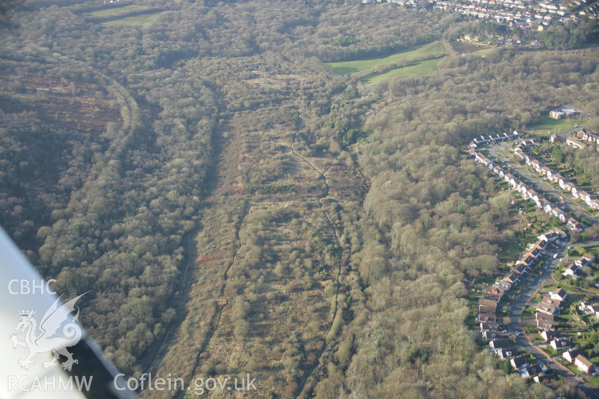 RCAHMW colour oblique aerial photograph of Clyne Valley Shaft Mounds from the south-east. Taken on 26 January 2006 by Toby Driver.