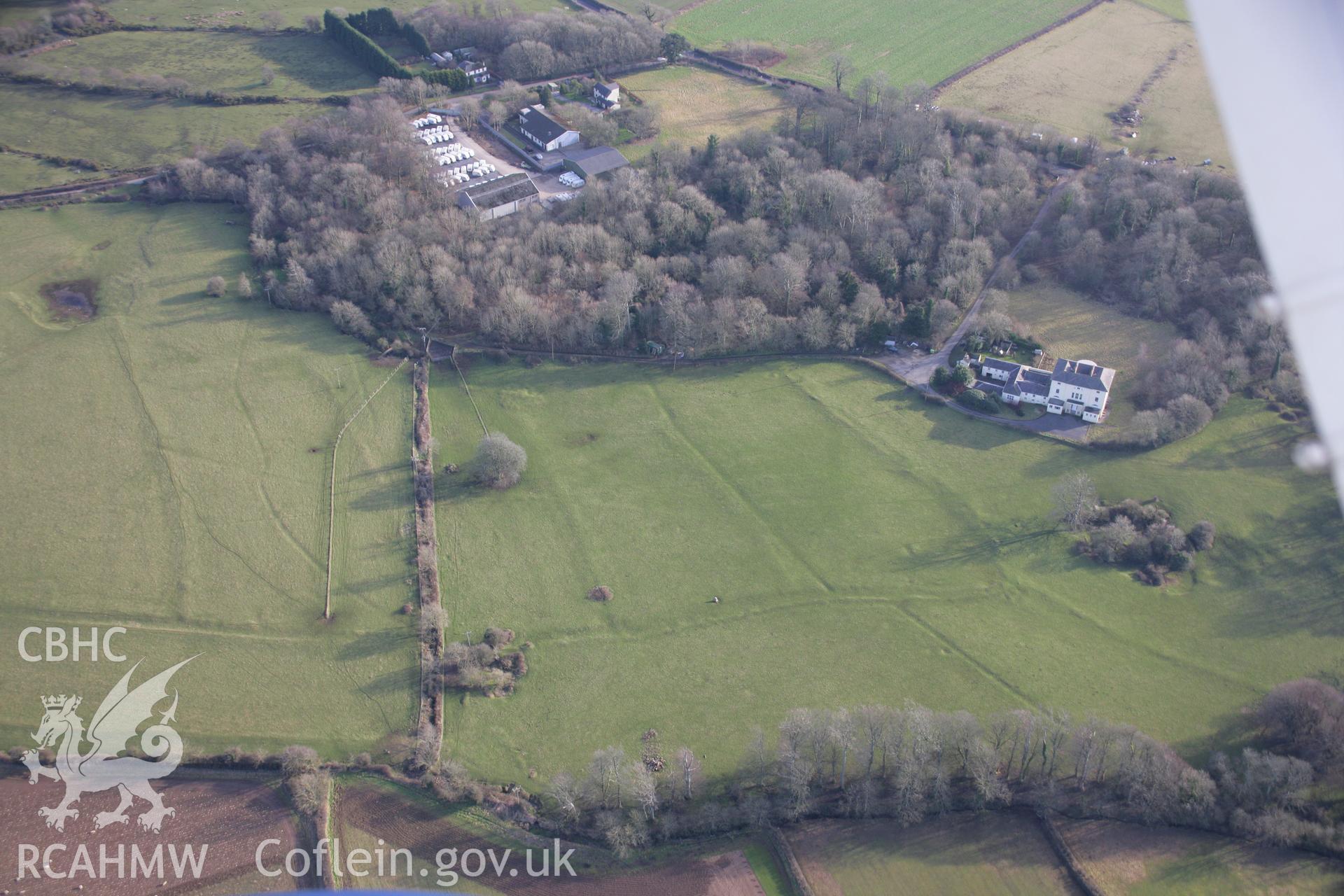 RCAHMW colour oblique aerial photograph of Stout Hall Earthworks from the west. Taken on 26 January 2006 by Toby Driver.