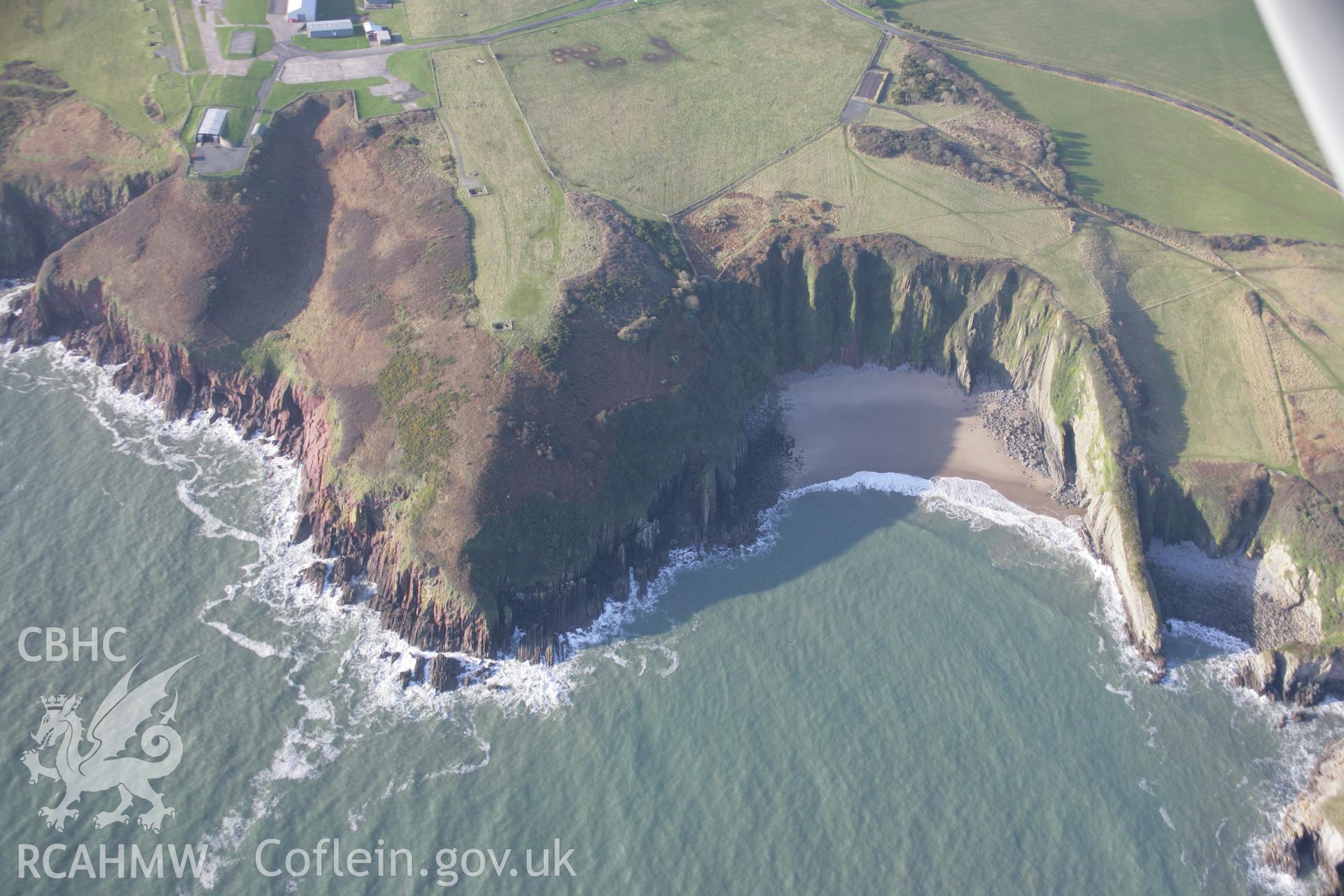 RCAHMW colour oblique aerial photograph of Manorbier Airfield and Shrinkle Haven, viewed from the east. Taken on 11 January 2006 by Toby Driver.