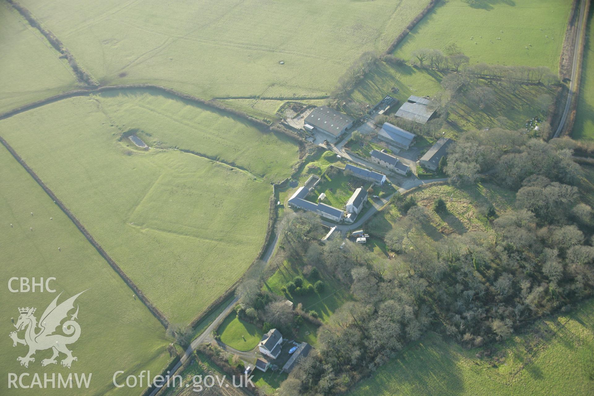 RCAHMW colour oblique aerial photograph of Coedcanlas Garden Earthworks, Martletwy, from the north-east. Taken on 26 January 2006 by Toby Driver.