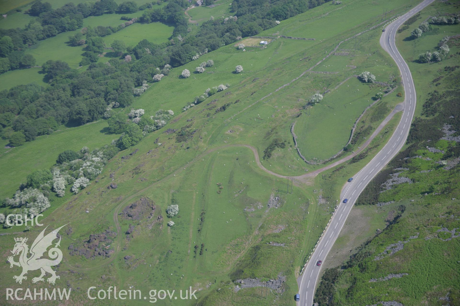 RCAHMW colour oblique aerial photograph of Garnddyrys Forge, on The Blorenge, from the south-west. Taken on 09 June 2006 by Toby Driver.