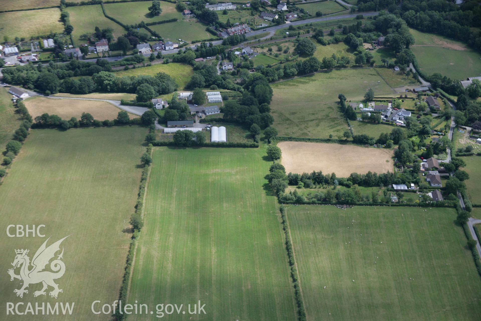 RCAHMW colour oblique aerial photograph of Llandrindod Common Roman Camp XVI. Taken on 27 July 2006 by Toby Driver.