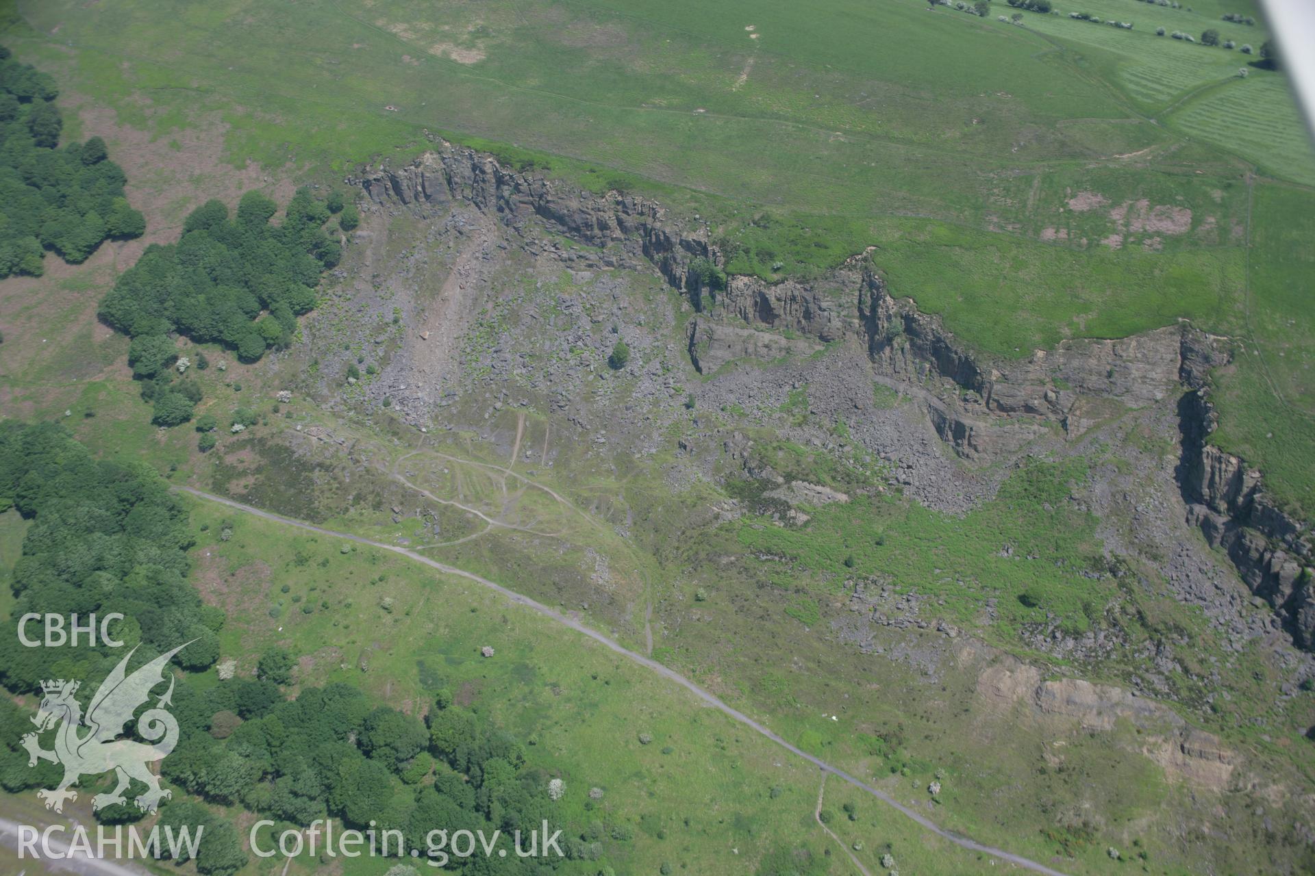 RCAHMW colour oblique aerial photograph of Tredegar Ironworks Cholera Cemetery from the west. Taken on 09 June 2006 by Toby Driver.