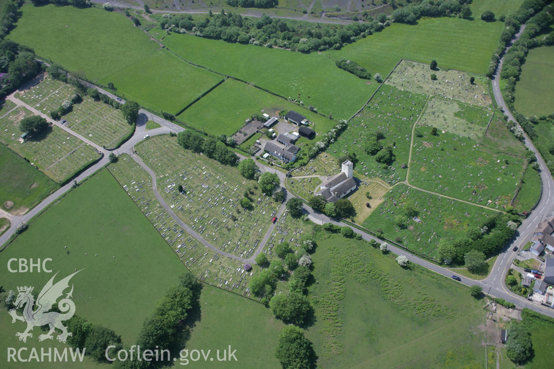 RCAHMW colour oblique aerial photograph of St Sannan's Church, Bedwellty, from the north-east. Taken on 09 June 2006 by Toby Driver.