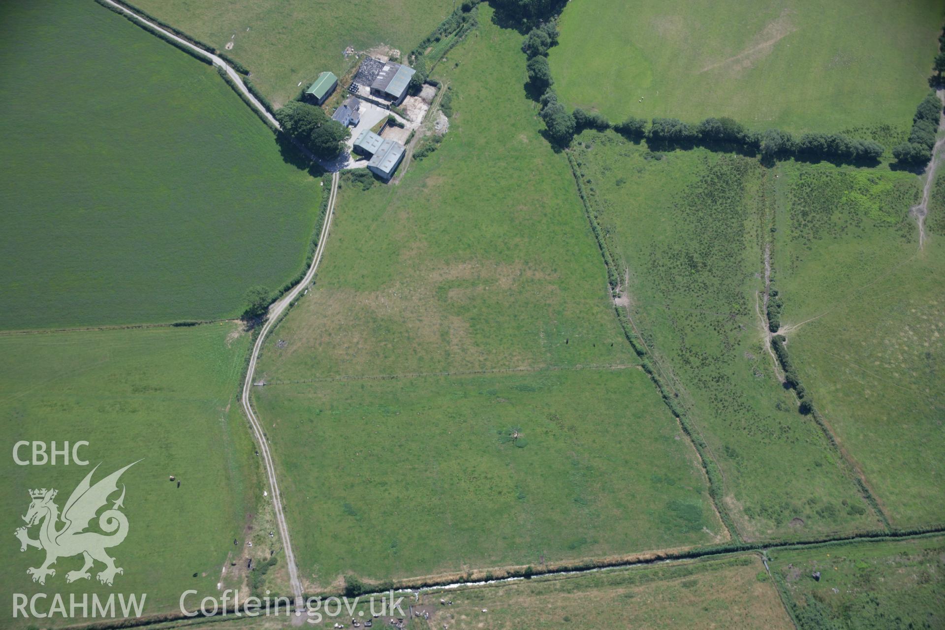 RCAHMW colour oblique aerial photograph of Ynyscapel Enclosure. Taken on 17 July 2006 by Toby Driver.