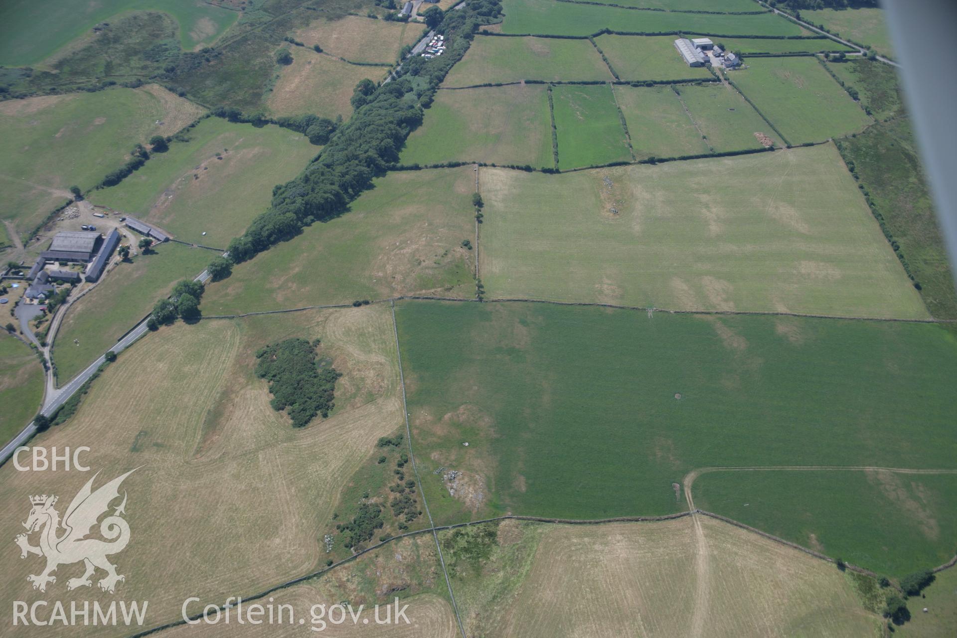 RCAHMW colour oblique aerial photograph of Ty-Mawr Enclosure. Taken on 18 July 2006 by Toby Driver.