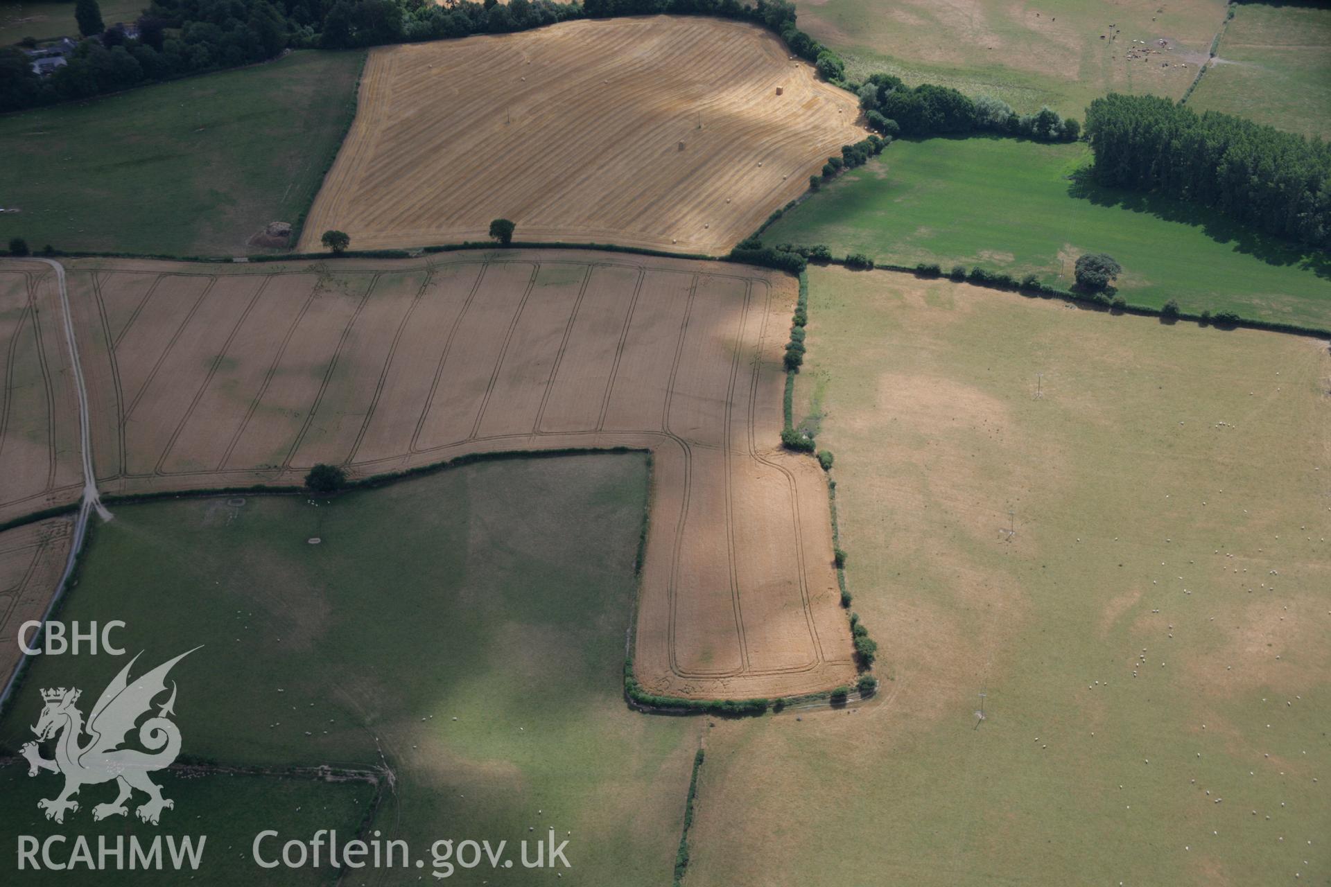 RCAHMW colour oblique aerial photograph of Womaston. Taken on 27 July 2006 by Toby Driver.