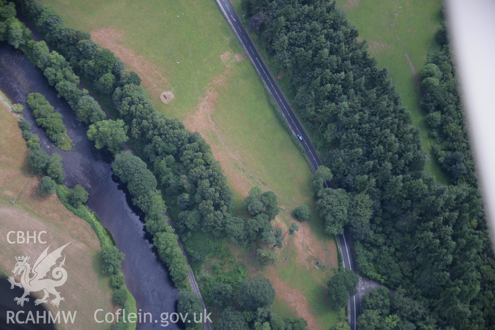 RCAHMW colour oblique aerial photograph of Owain Glyndwr's Mount. Taken on 31 July 2006 by Toby Driver.