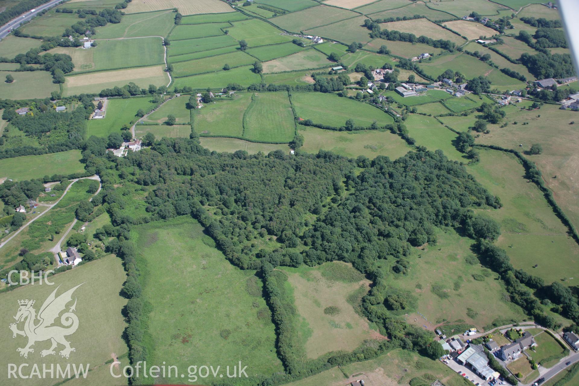 RCAHMW colour oblique aerial photograph of Burial Chamber, Coedparcgarw. Taken on 24 July 2006 by Toby Driver.