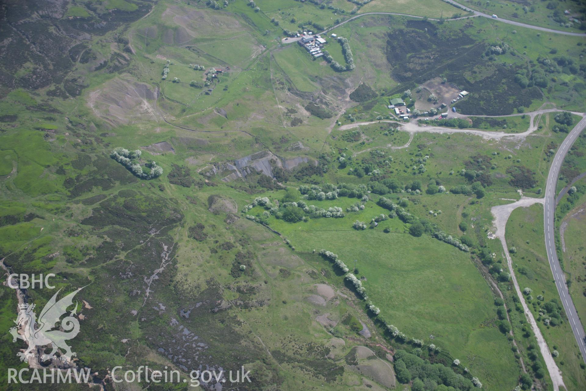 RCAHMW colour oblique aerial photograph of the south portal of the Pwll Du Tunnel on Hill's Tramroad from the north-west. Taken on 09 June 2006 by Toby Driver.