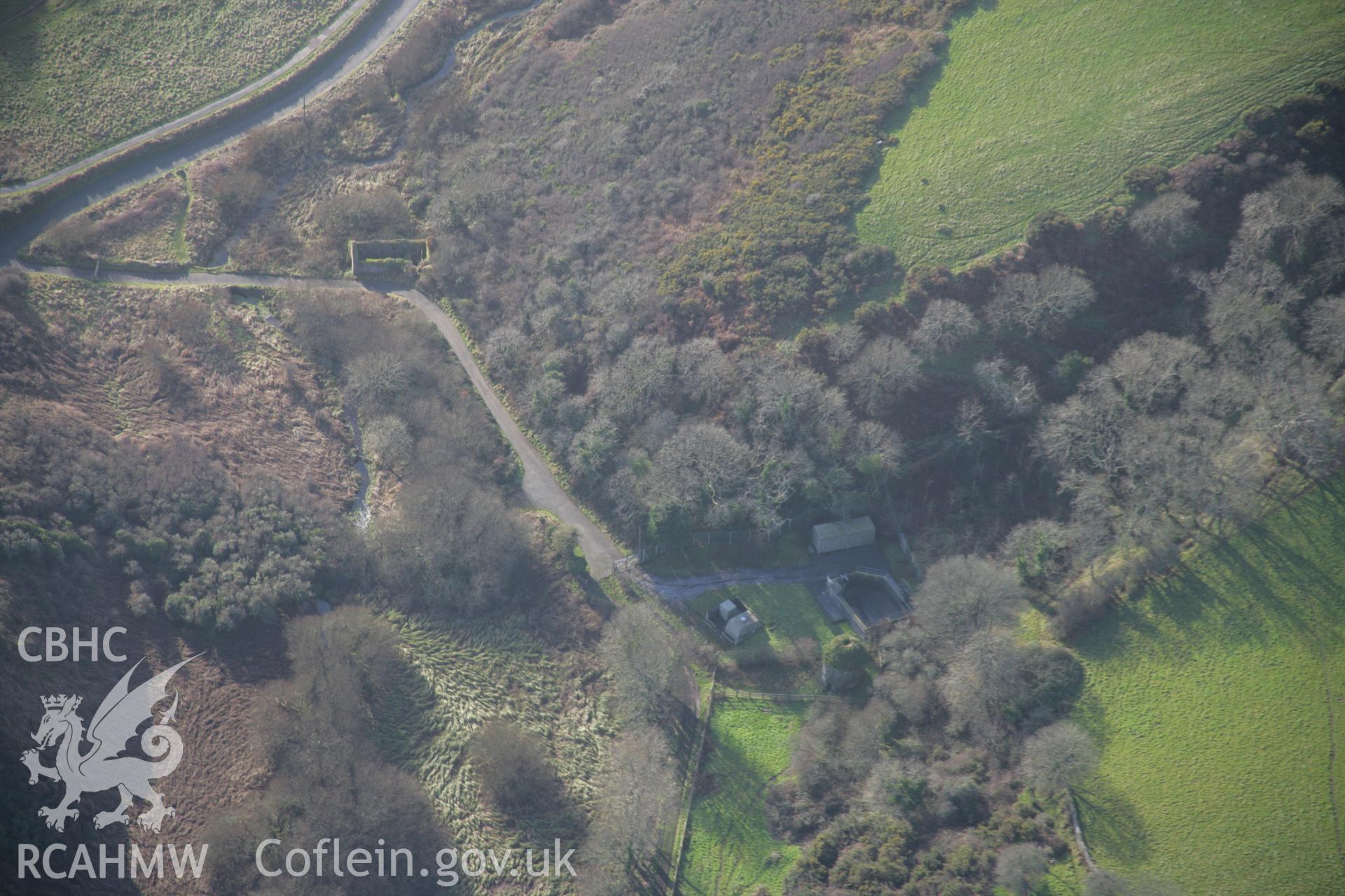 RCAHMW colour oblique aerial photograph of Manorbier Castle Dovecote, viewed from the north-east. Taken on 11 January 2006 by Toby Driver.