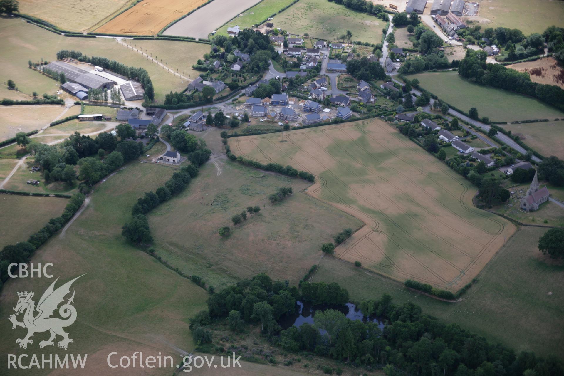 RCAHMW colour oblique aerial photograph of Dunn's Lane Motte and defended enclosure. Taken on 27 July 2006 by Toby Driver