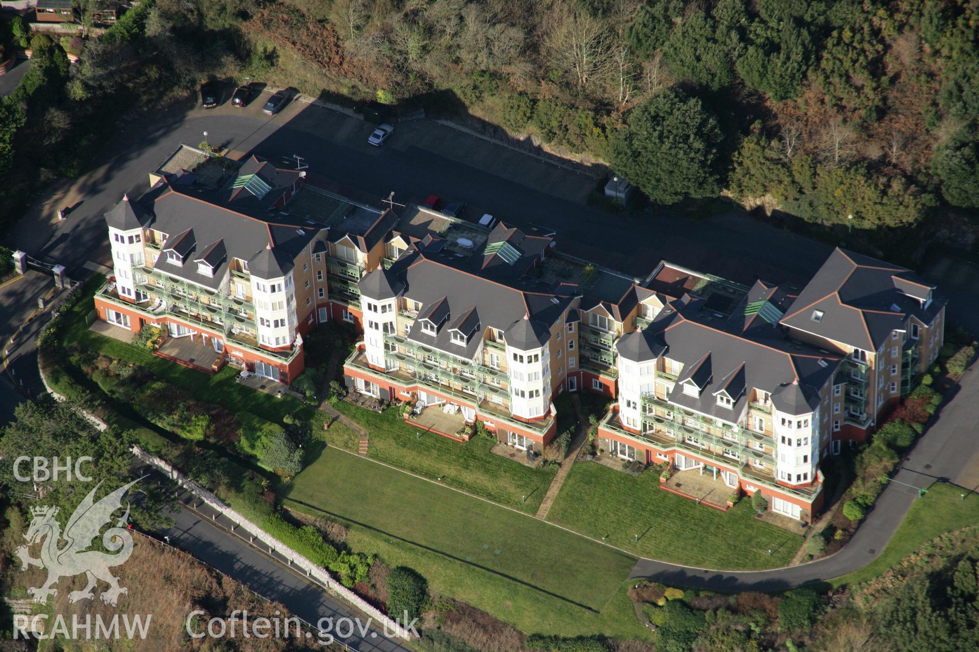 RCAHMW colour oblique aerial photograph of Victoria Villa, Caswell Bay Hotel, from the south. Taken on 26 January 2006 by Toby Driver.