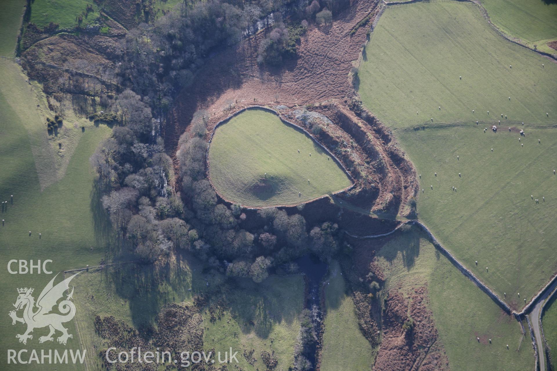 RCAHMW colour oblique aerial photograph of Craig-y-Dinas Camp from the north-east. Taken on 09 February 2006 by Toby Driver.