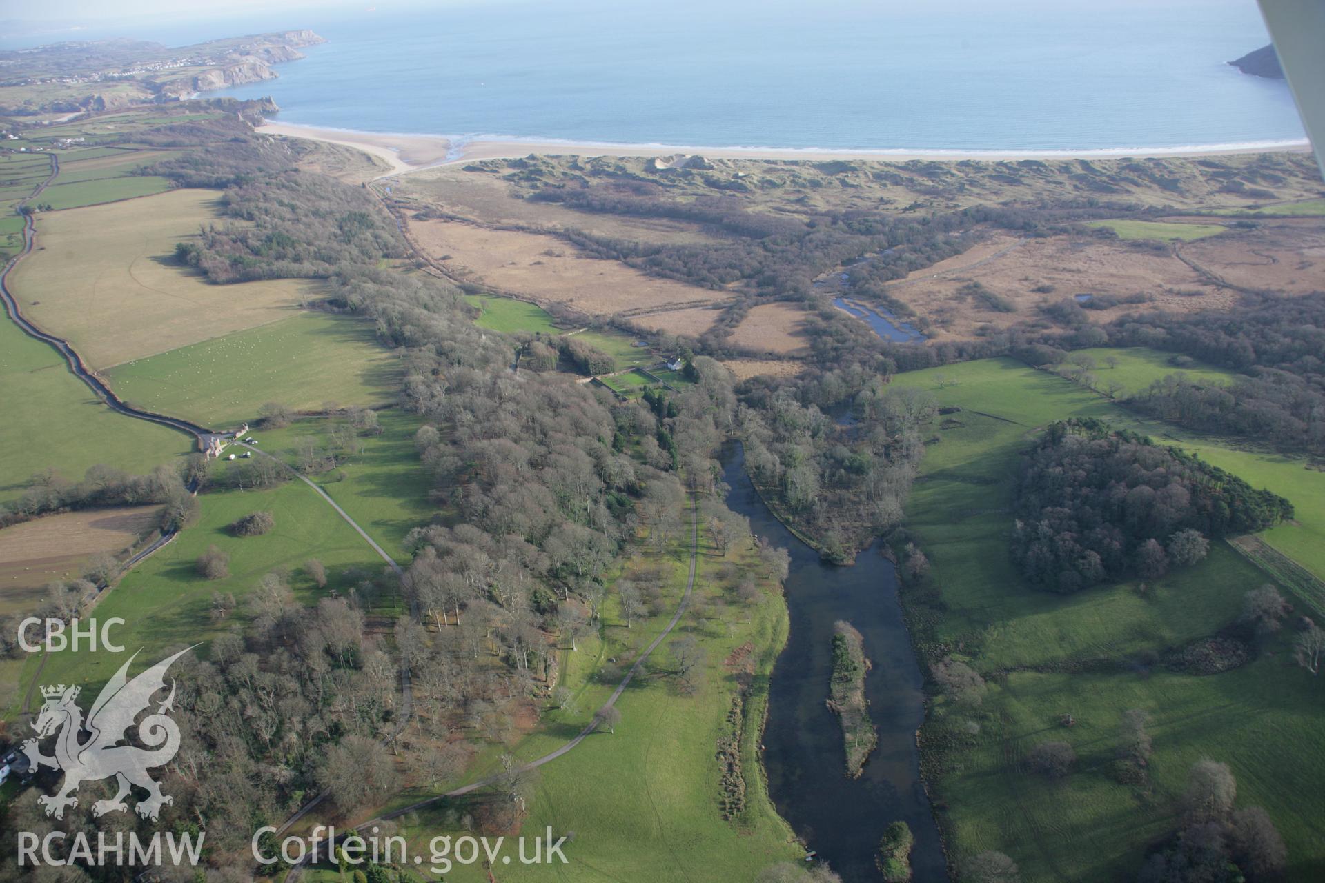 RCAHMW colour oblique aerial photograph of Penrice Castle Garden, with view of parkland looking to the south-east. Taken on 26 January 2006 by Toby Driver.