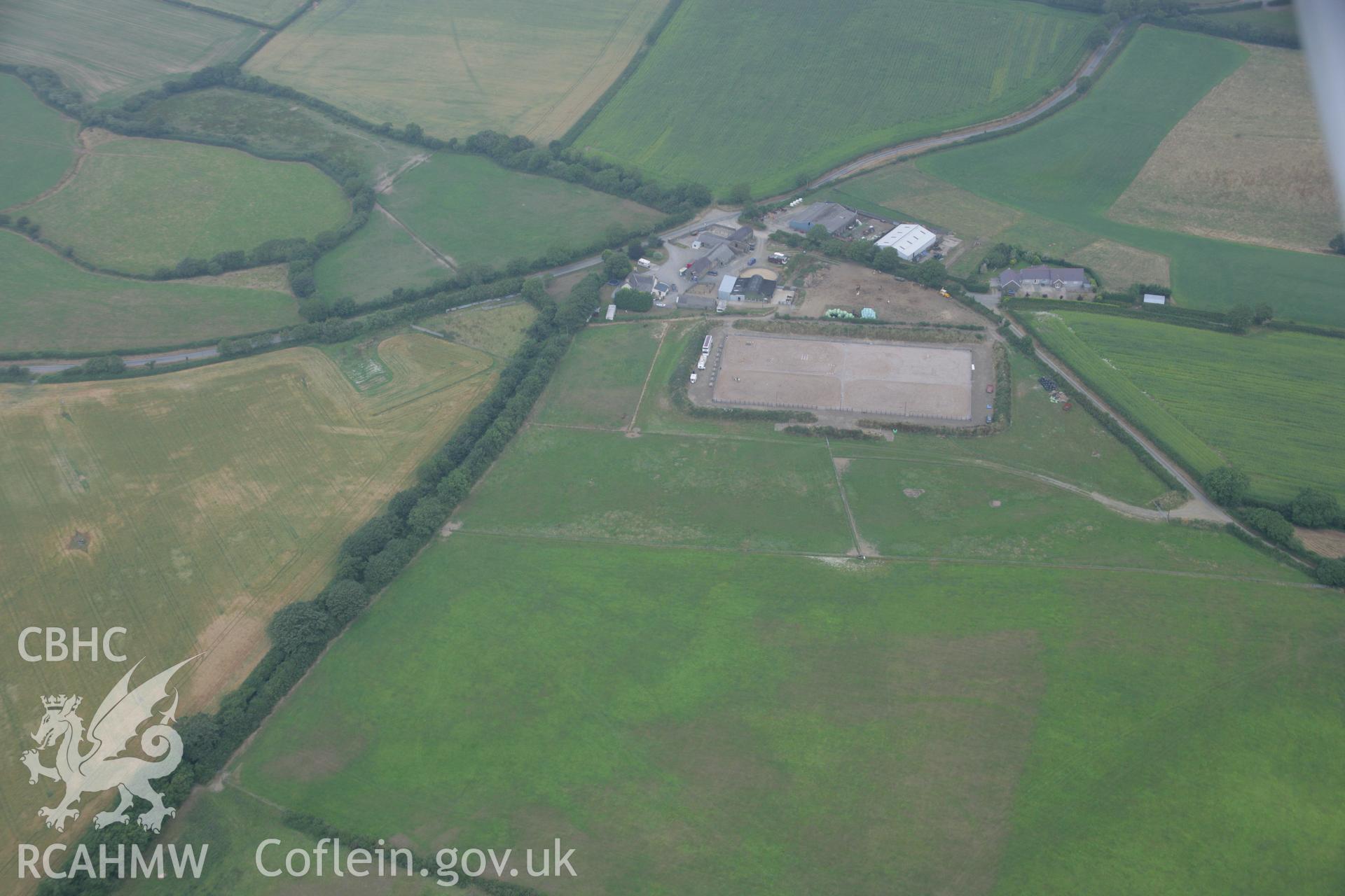 RCAHMW colour oblique aerial photograph of the Roman road west of Carmarthen at Broadway with the road showing as a cropmark. Taken on 21 July 2006 by Toby Driver.