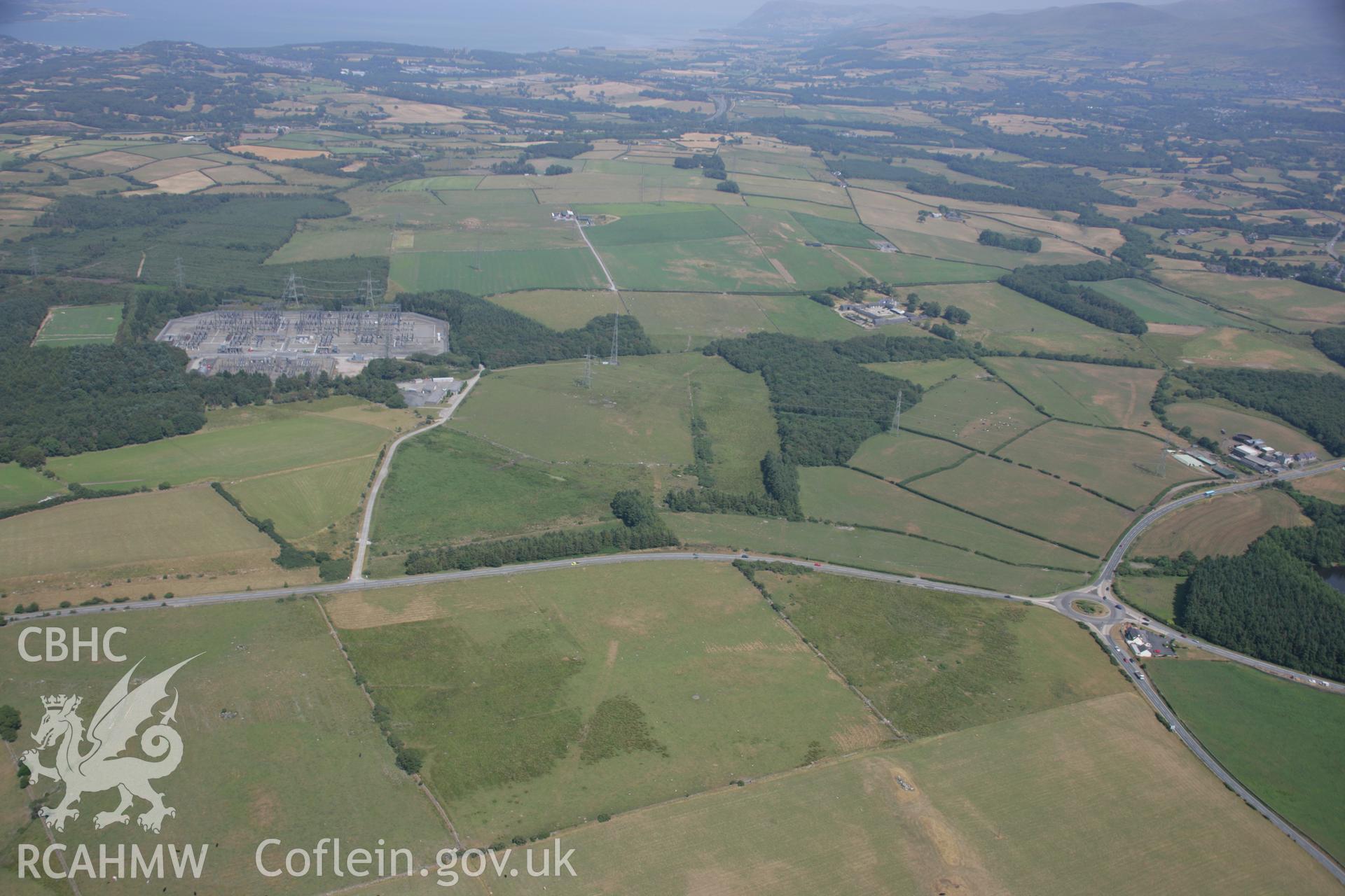 RCAHMW colour oblique aerial photograph of Roman road parchmarks Taken on 25 July 2006 by Toby Driver.