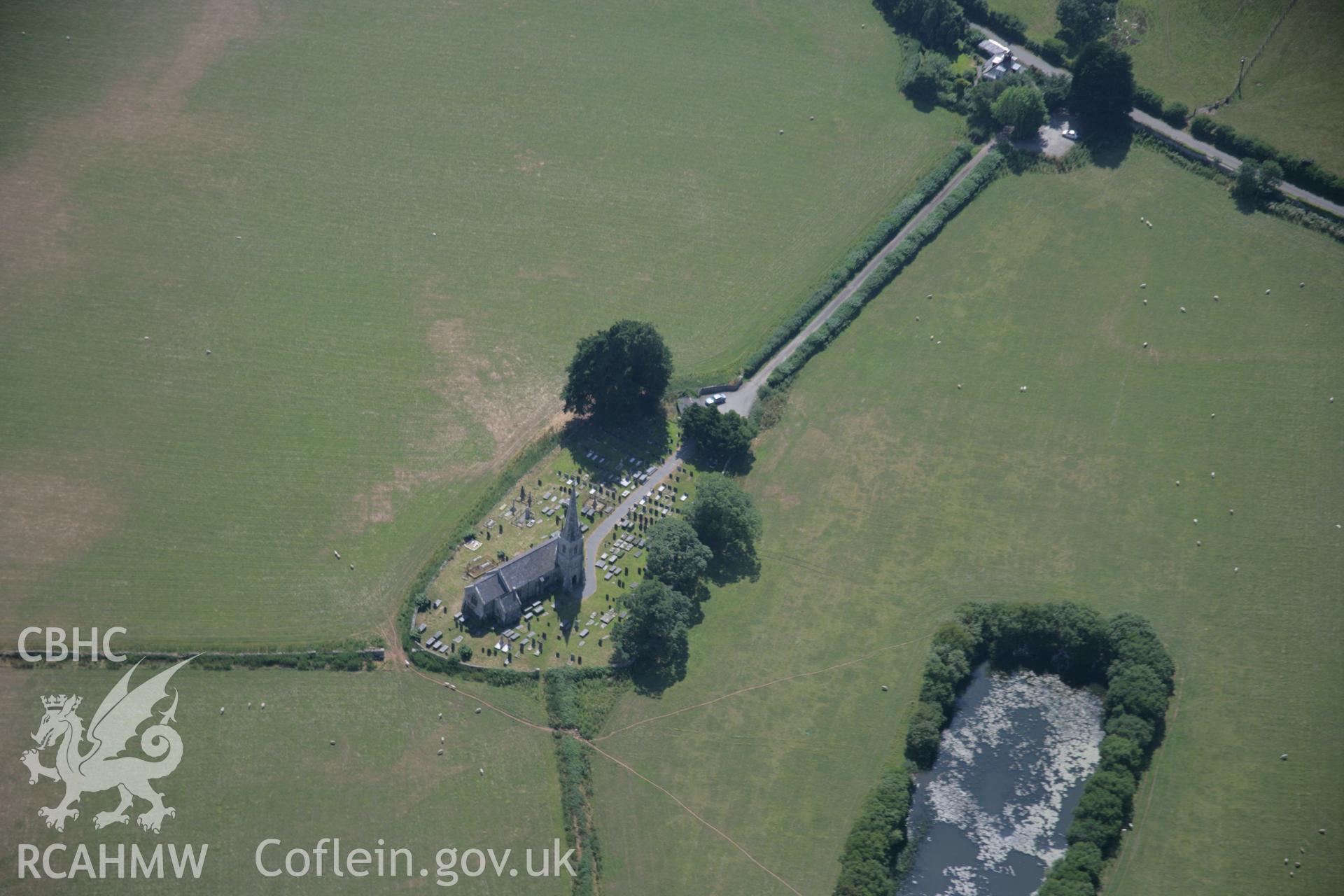 RCAHMW colour oblique aerial photograph of St Edwen's Church, Llanedwen. Taken on 25 July 2006 by Toby Driver.