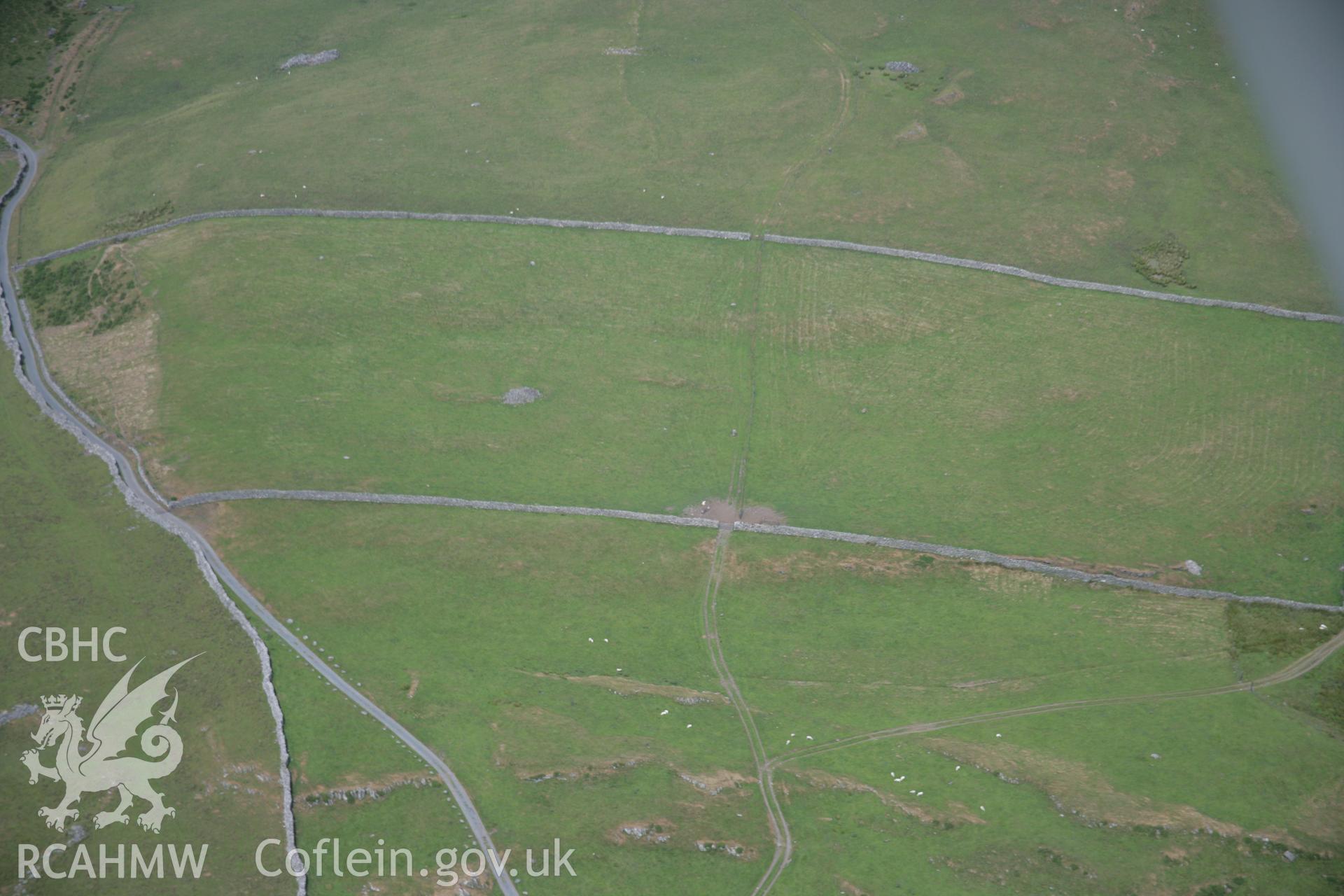 RCAHMW colour oblique aerial photograph of Fonlief Hir Standing Stone D. Taken on 25 July 2006 by Toby Driver.