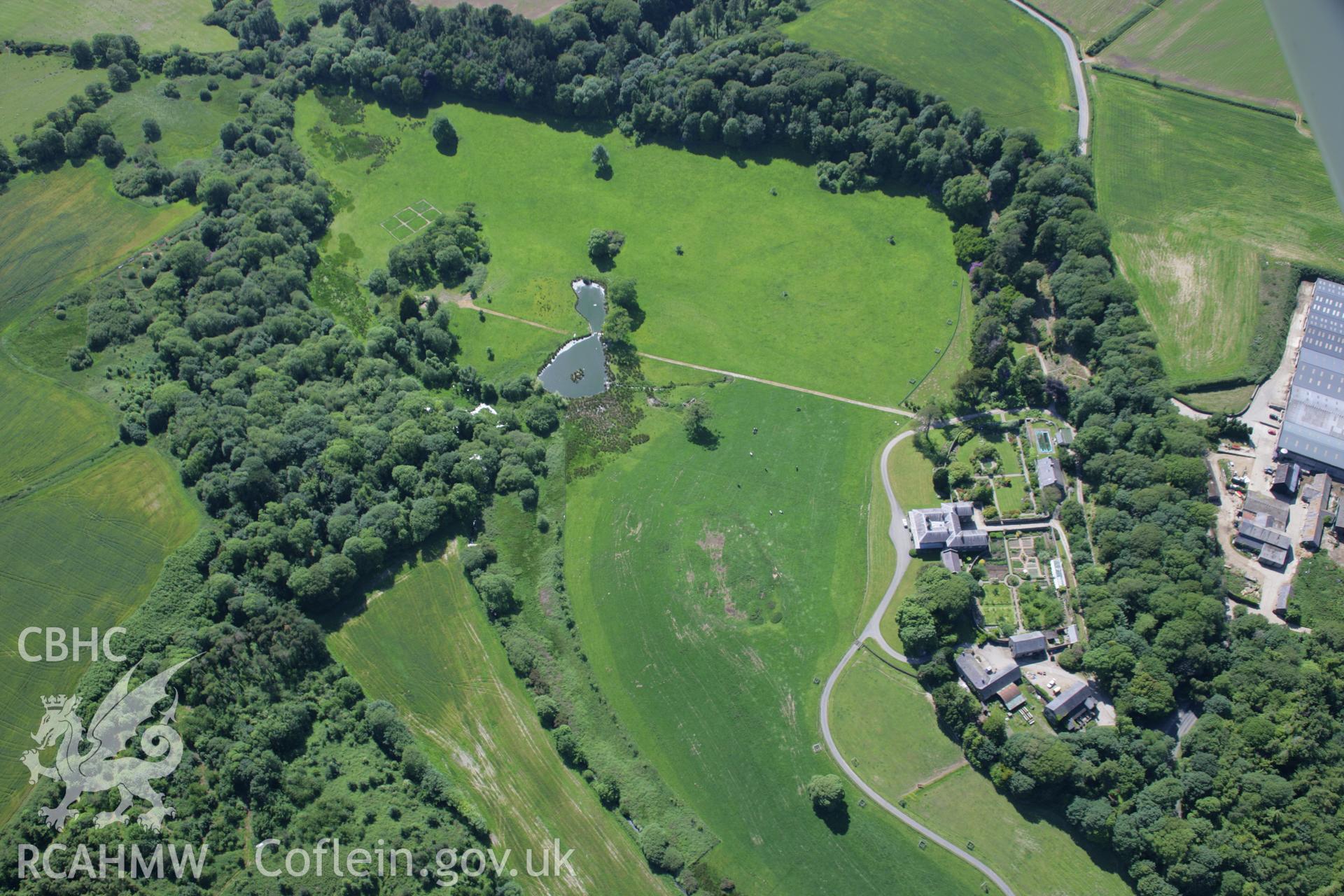 RCAHMW colour oblique aerial photograph of the parkland and garden at Nanhoron, Botwnnog. A high view from the east. Taken on 14 June 2006 by Toby Driver.