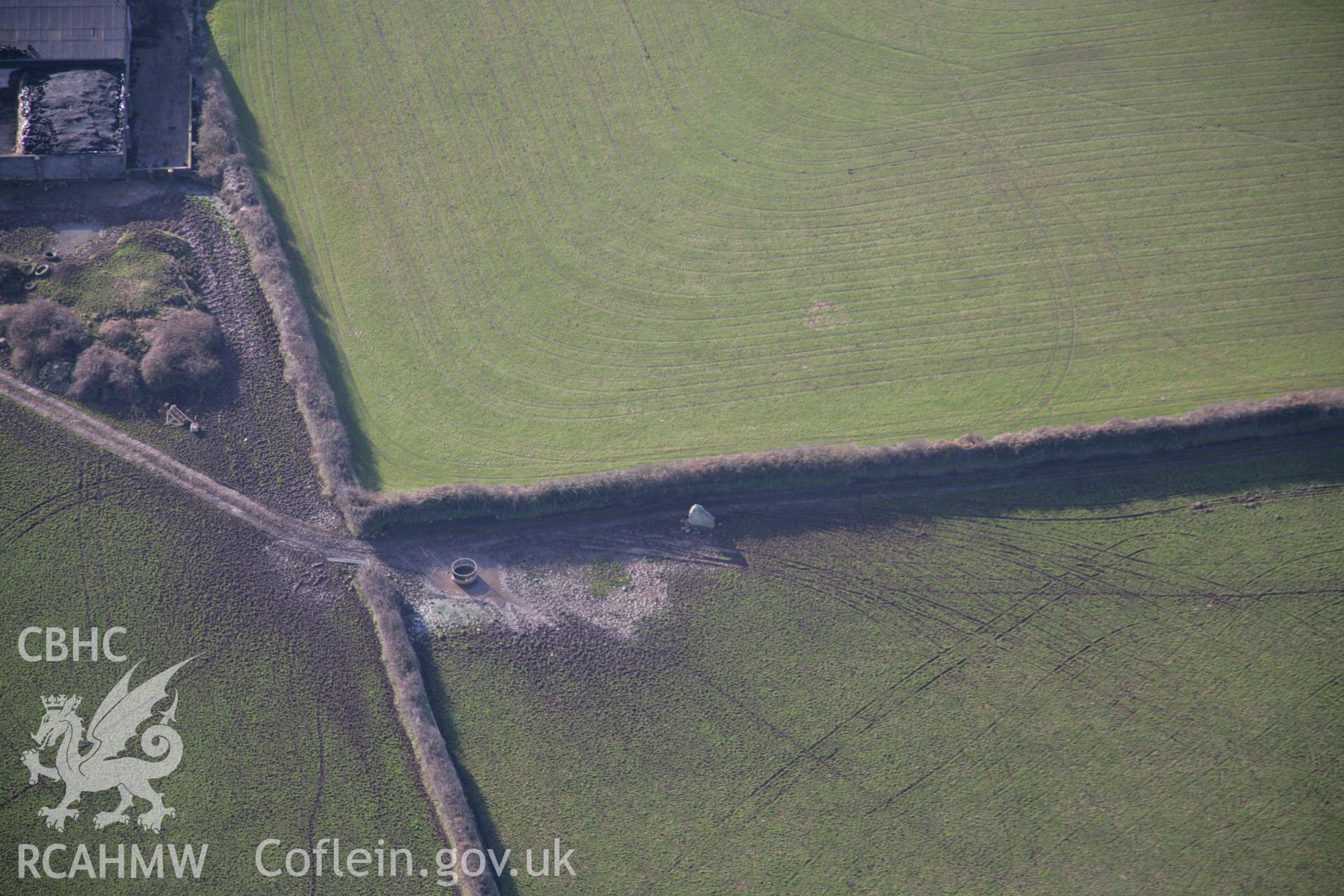 RCAHMW colour oblique aerial photograph of Burry Standing Stone, Knelston, from the east. Taken on 26 January 2006 by Toby Driver.