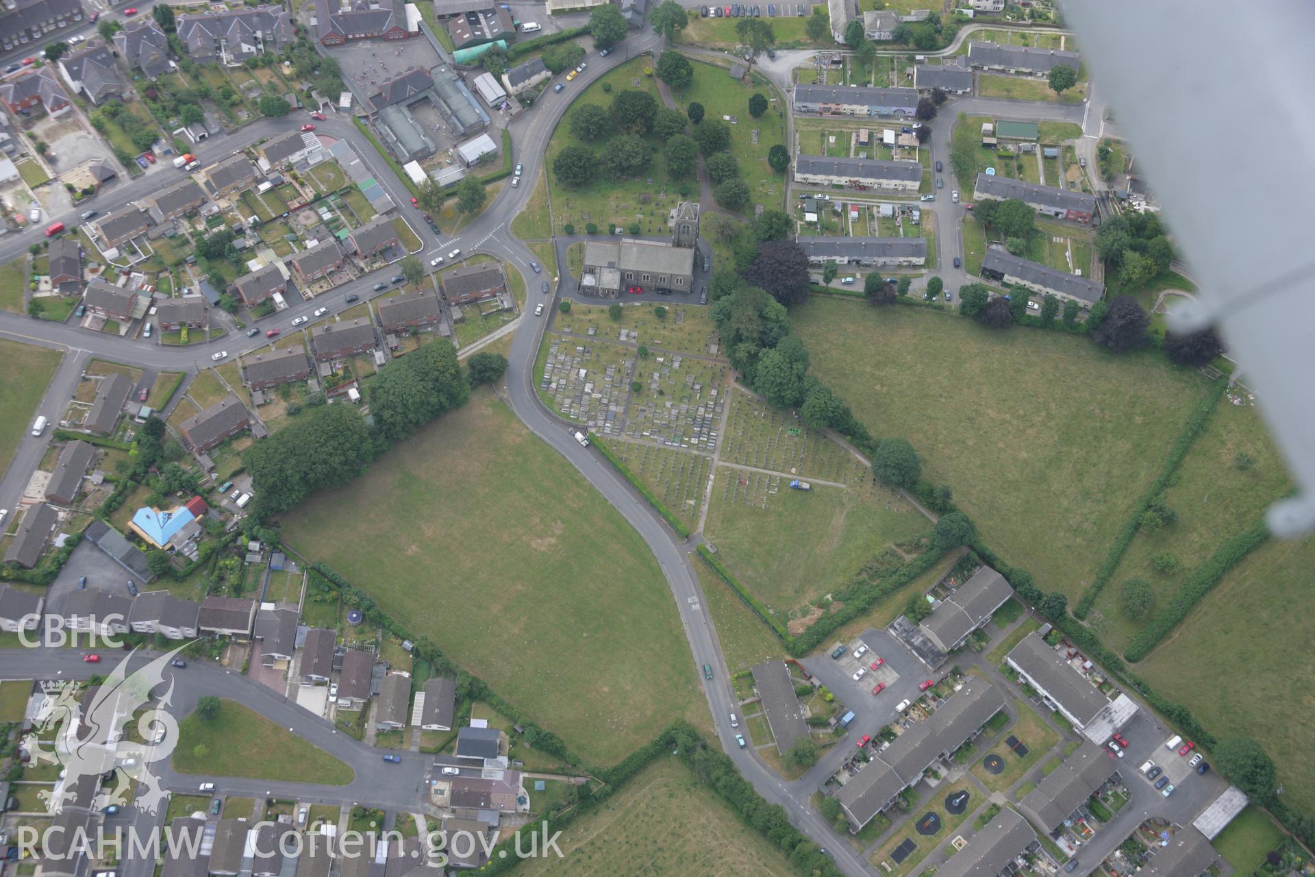 RCAHMW colour oblique aerial photograph of St Peter's Church, Lampeter. Taken on 21 July 2006 by Toby Driver.