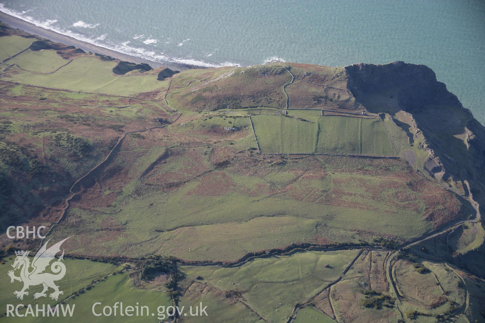 RCAHMW colour oblique aerial photograph of a longhouse and field system at Ciliau-Uchaf from the south-east. Taken on 09 February 2006 by Toby Driver.