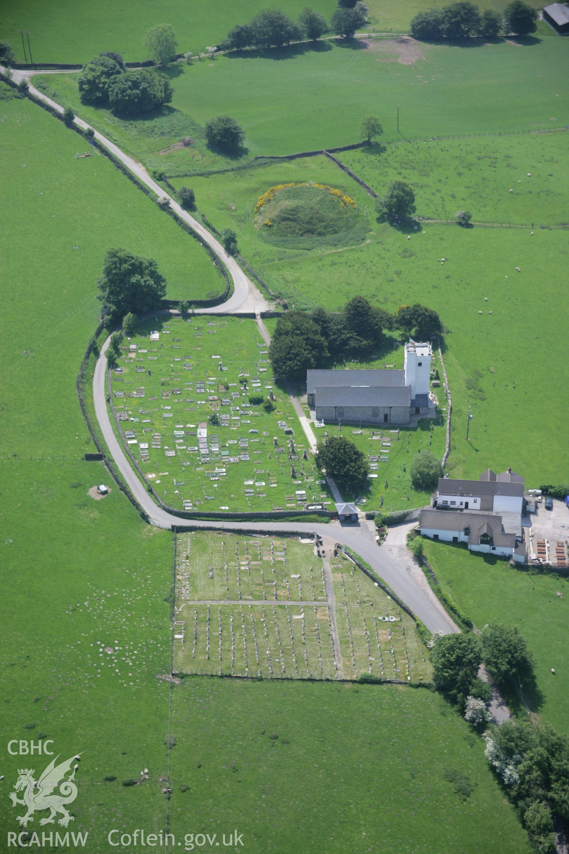 RCAHMW colour oblique aerial photograph of Twyn Tudur Motte from the north. Taken on 09 June 2006 by Toby Driver.