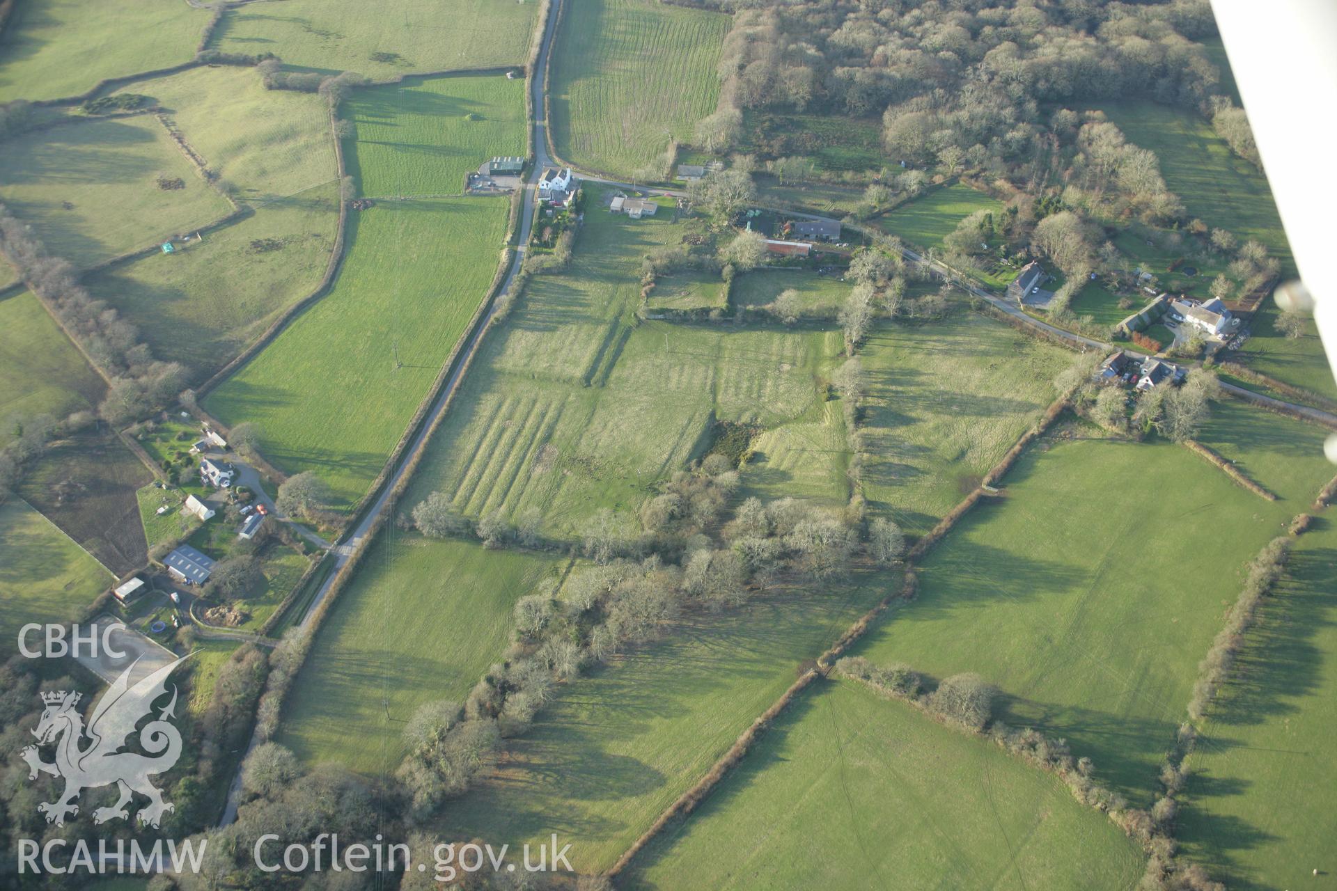 RCAHMW colour oblique aerial photograph of Landshipping House Garden Earthworks, viewed from the south-east. Taken on 26 January 2006 by Toby Driver.