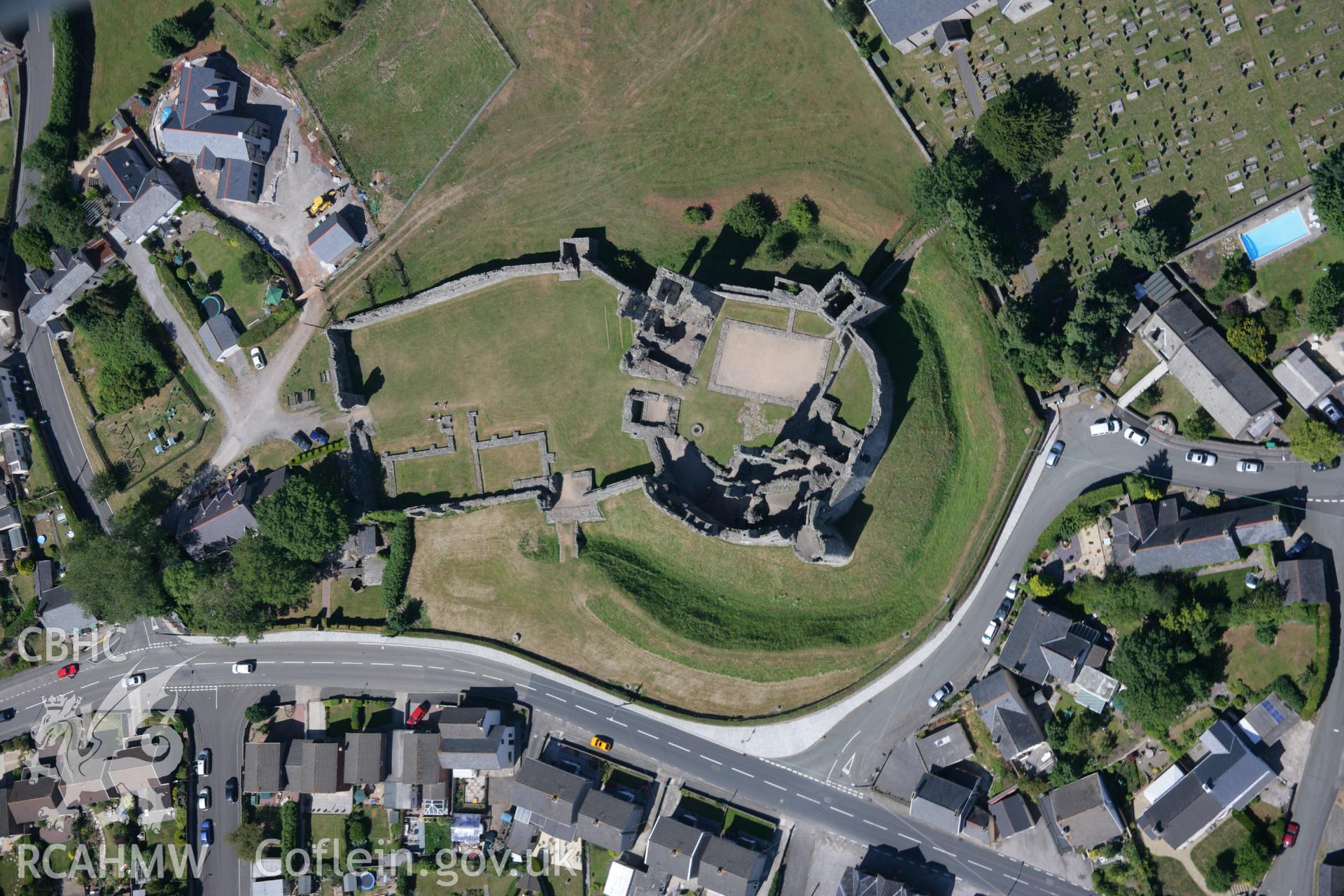 RCAHMW colour oblique aerial photograph of Coity Castle. Taken on 24 July 2006 by Toby Driver.